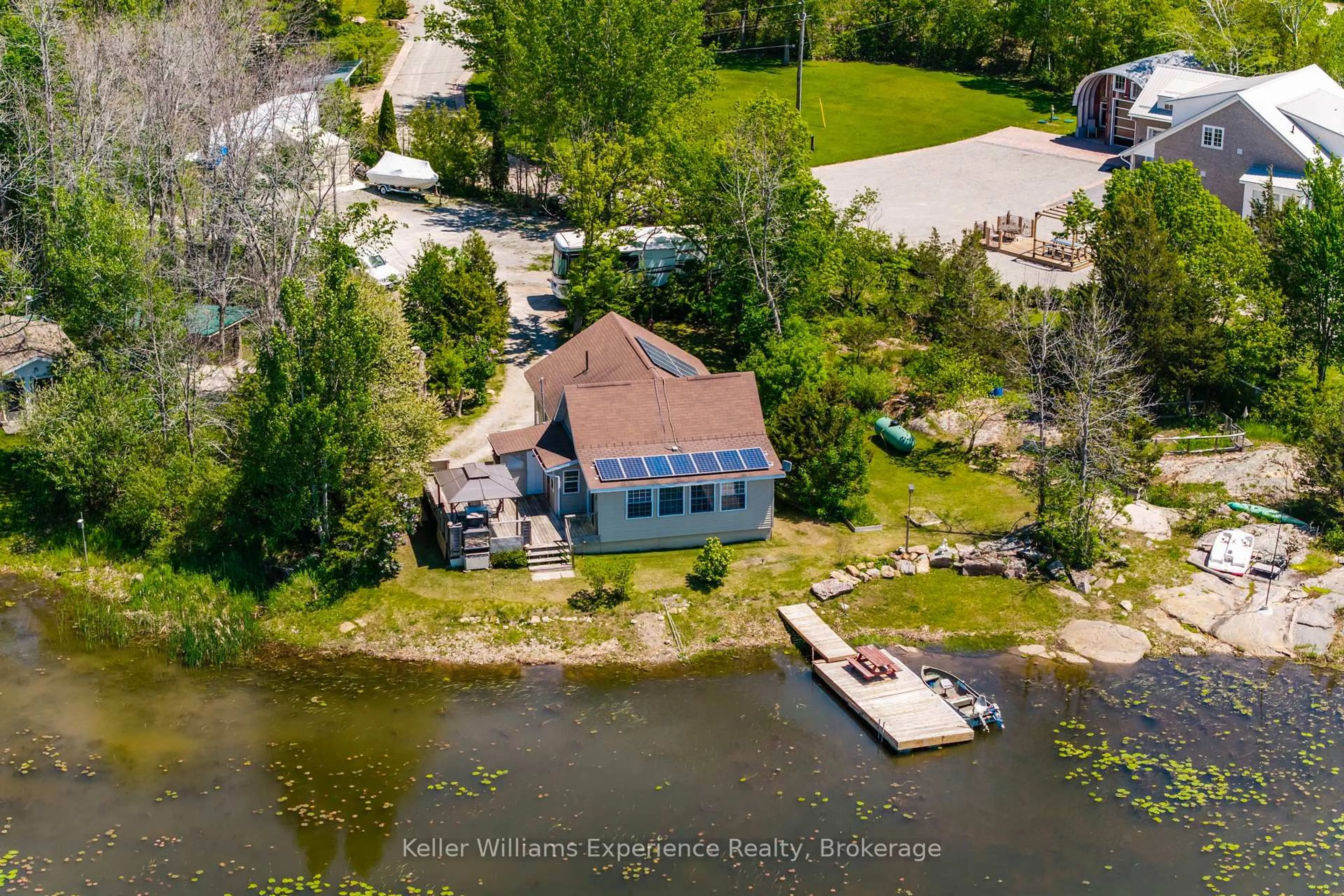 A pic from outside/outdoor area/front of a property/back of a property/a pic from drone, water/lake/river/ocean view for 111 Evergreen Lane, Georgian Bay Ontario L0K 1S0