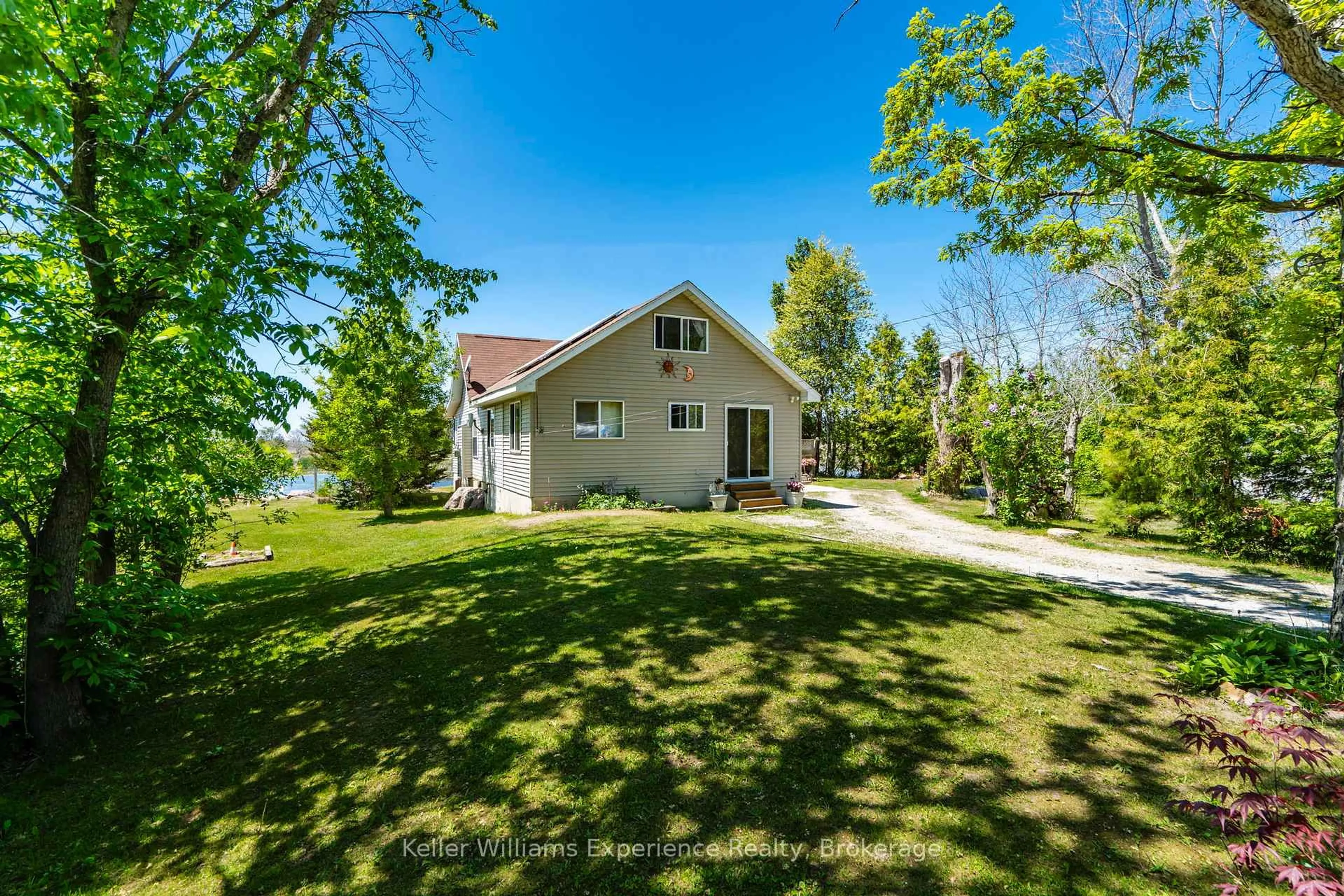 A pic from outside/outdoor area/front of a property/back of a property/a pic from drone, water/lake/river/ocean view for 111 Evergreen Lane, Georgian Bay Ontario L0K 1S0