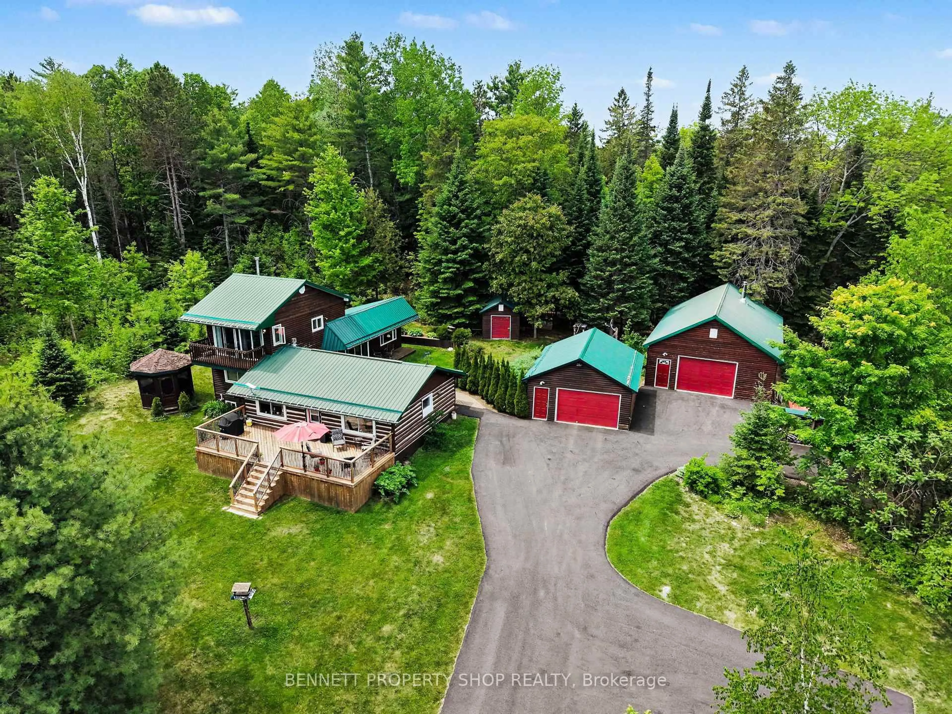 A pic from outside/outdoor area/front of a property/back of a property/a pic from drone, forest/trees view for 515 Graphite Bay Rd, Calabogie Ontario K0J 1H0