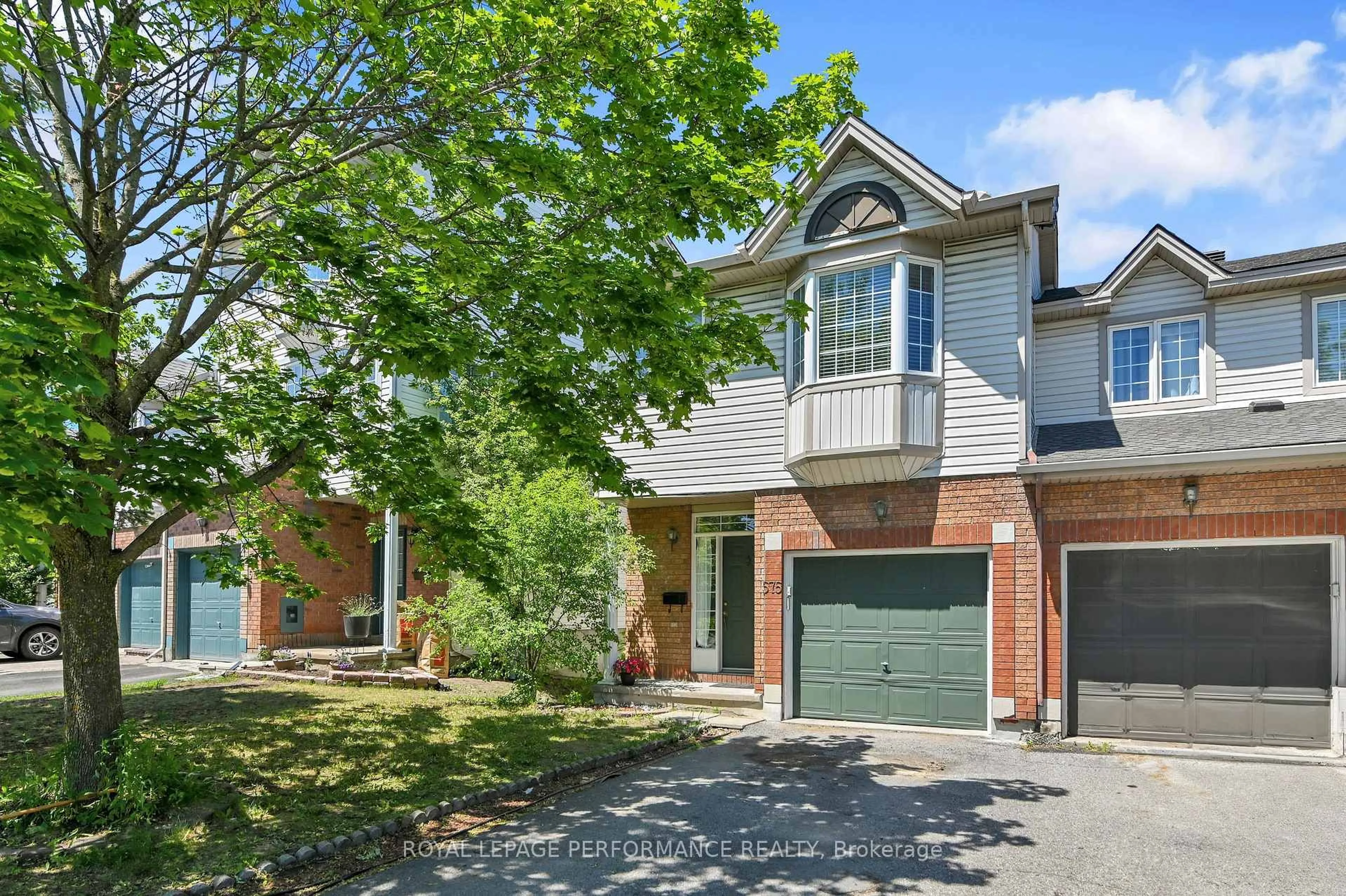 Home with brick exterior material, street for 575 Neighbourhood Way, Ottawa Ontario K1G 6N5