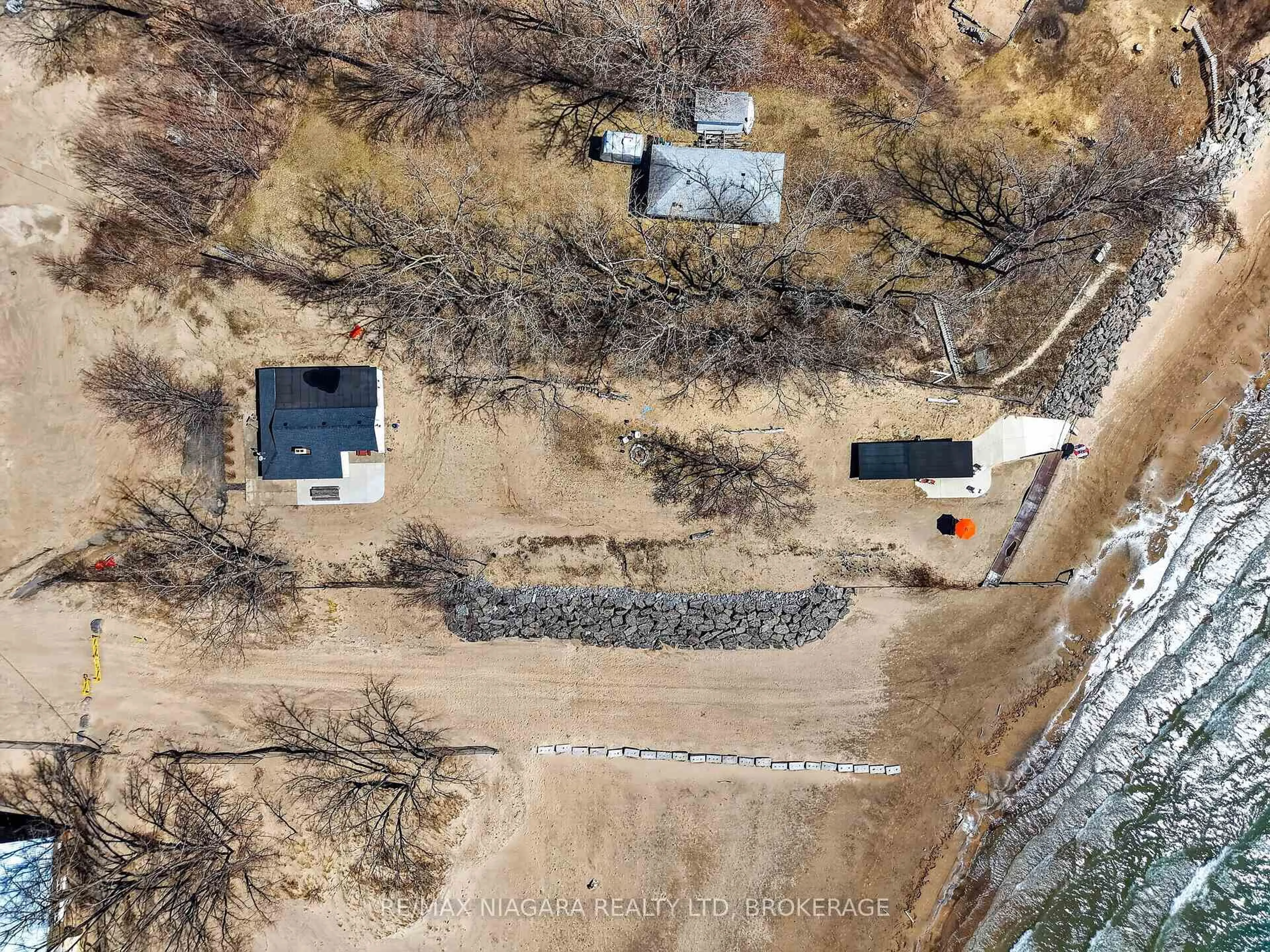 A pic from outside/outdoor area/front of a property/back of a property/a pic from drone, street for 239 Pleasant Beach Rd, Port Colborne Ontario L0S 1R0