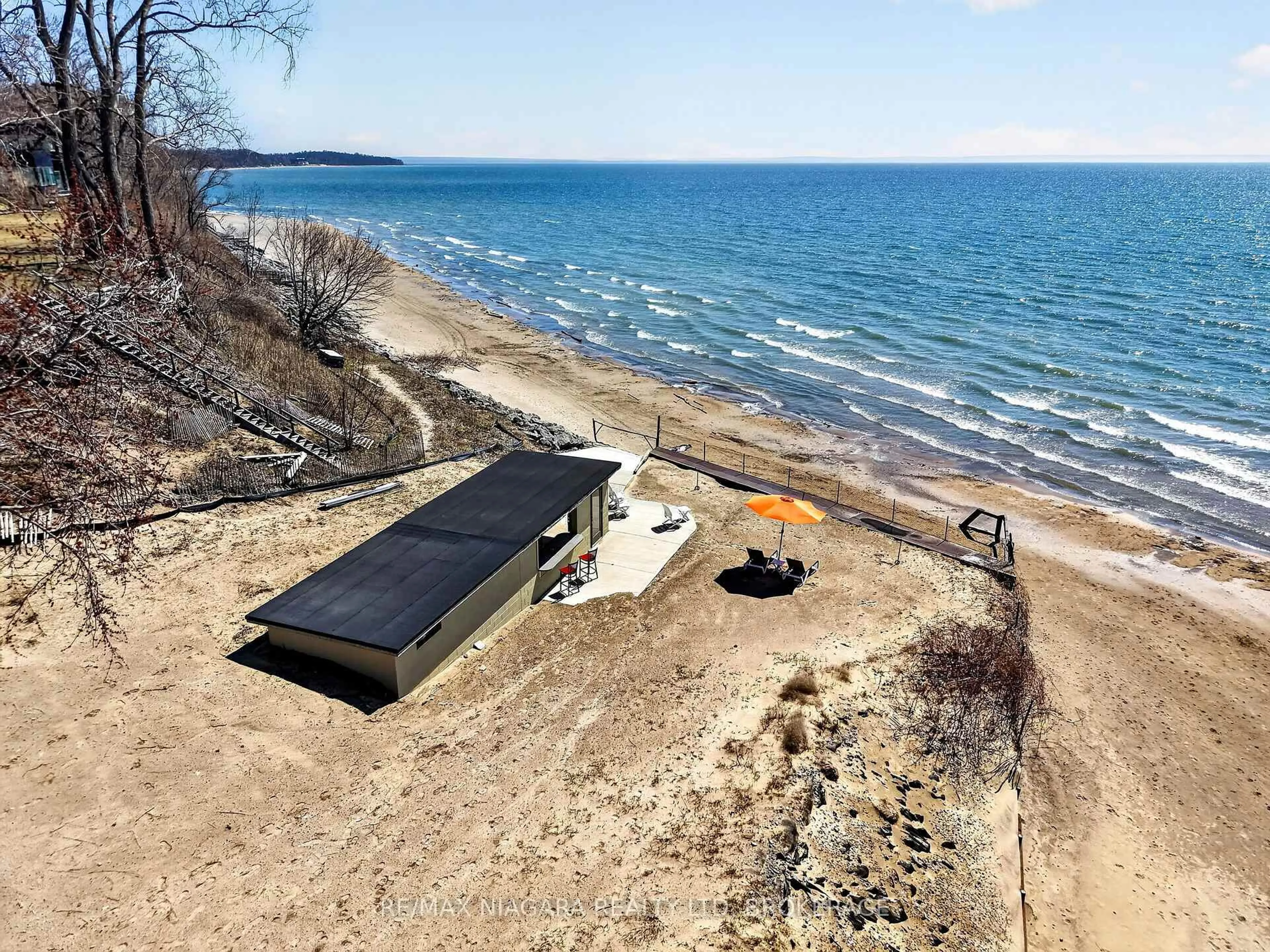 A pic from outside/outdoor area/front of a property/back of a property/a pic from drone, water/lake/river/ocean view for 239 Pleasant Beach Rd, Port Colborne Ontario L0S 1R0