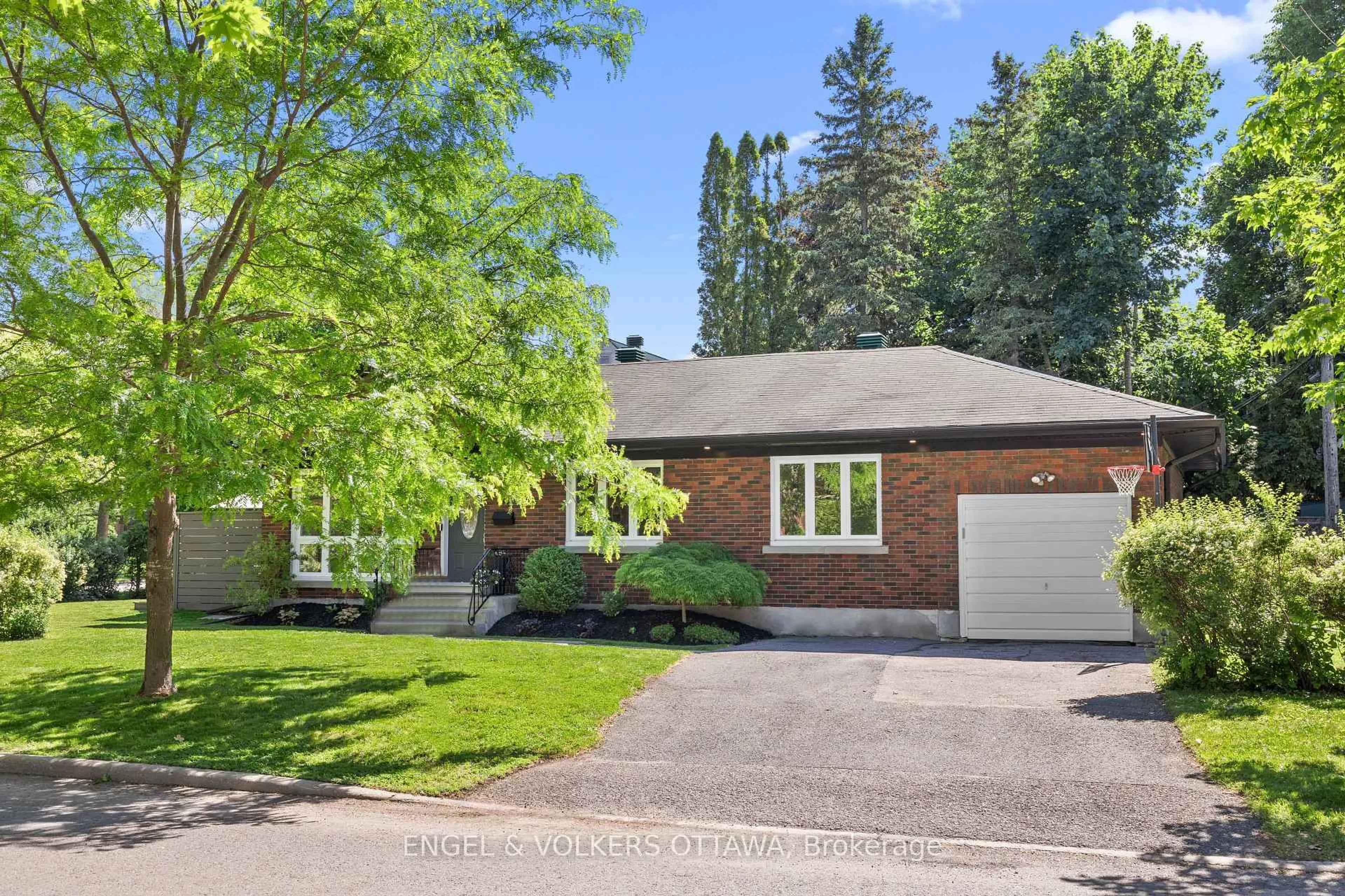 Home with brick exterior material, street for 2161 Blossom Dr, Ottawa Ontario K1H 6G6