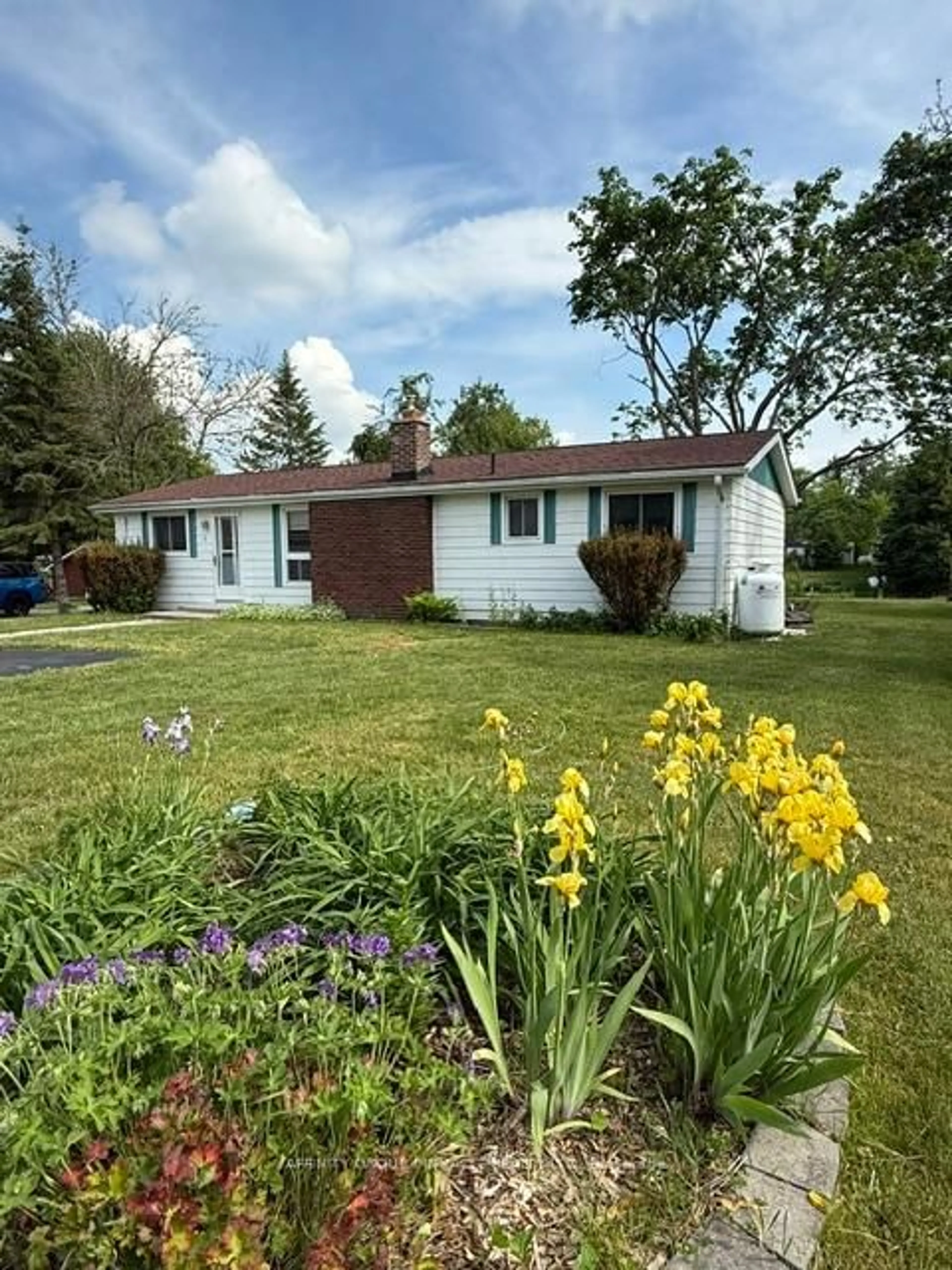 Home with vinyl exterior material, street for 12 North Bayou Rd, Kawartha Lakes Ontario K0M 1N0