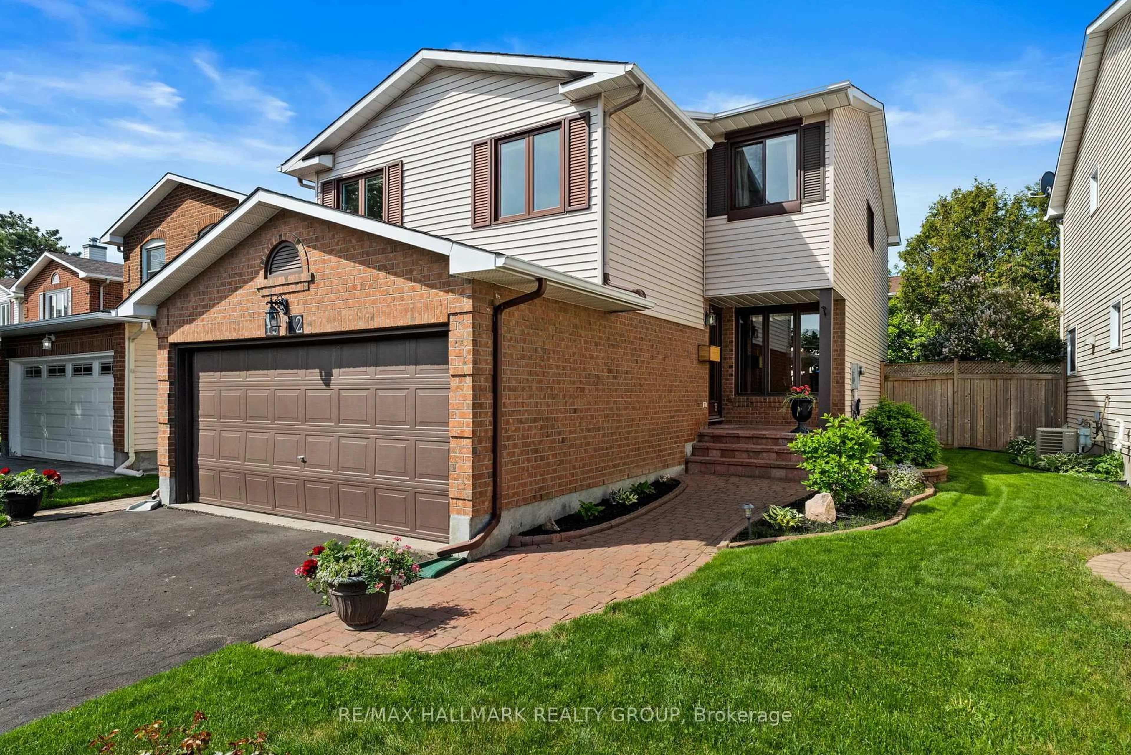 Home with brick exterior material, street for 1912 Des Epinettes Ave, Ottawa Ontario K1C 6P5