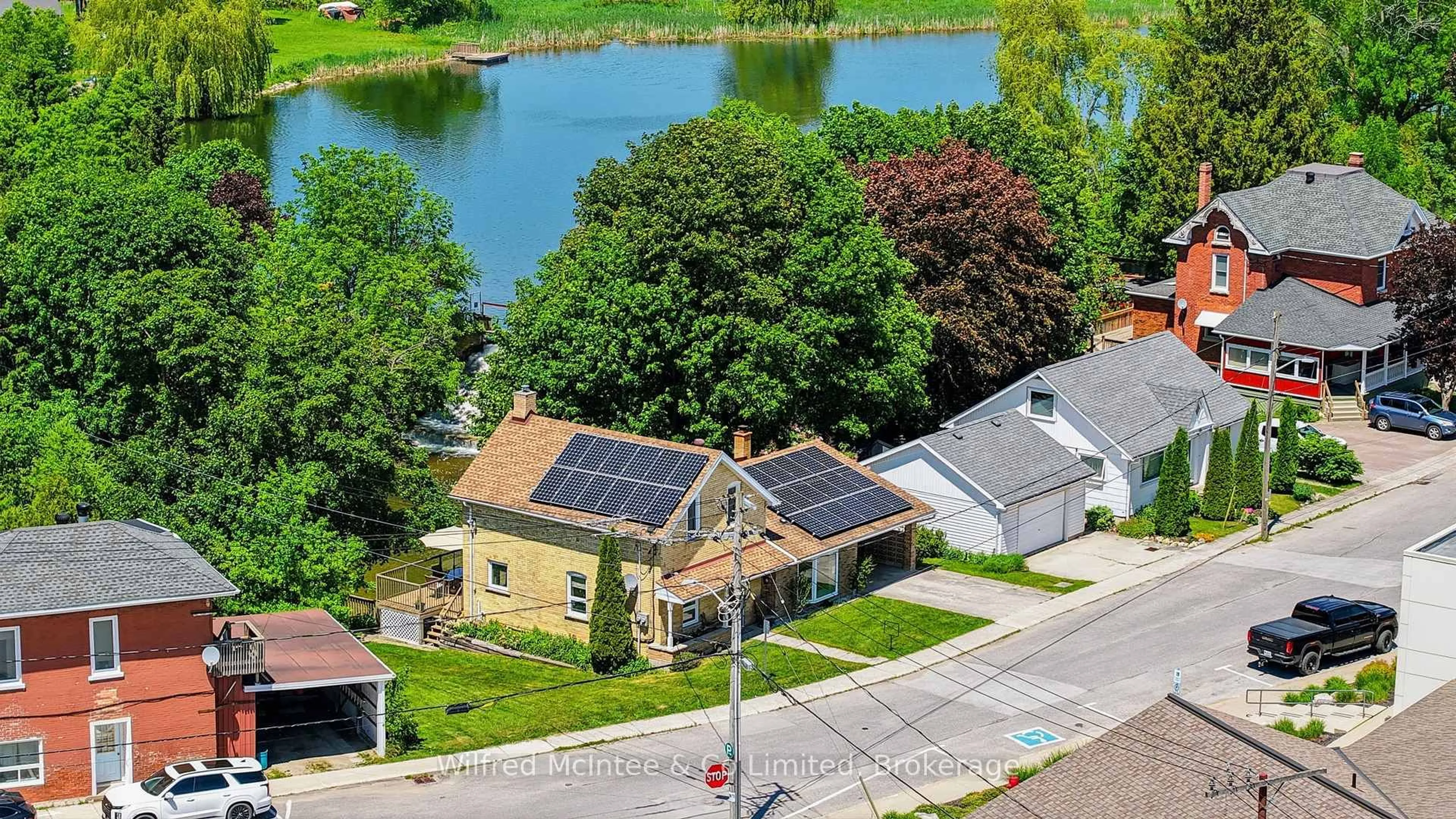 A pic from outside/outdoor area/front of a property/back of a property/a pic from drone, water/lake/river/ocean view for 38 2nd St, Arran-Elderslie Ontario N0G 1L0