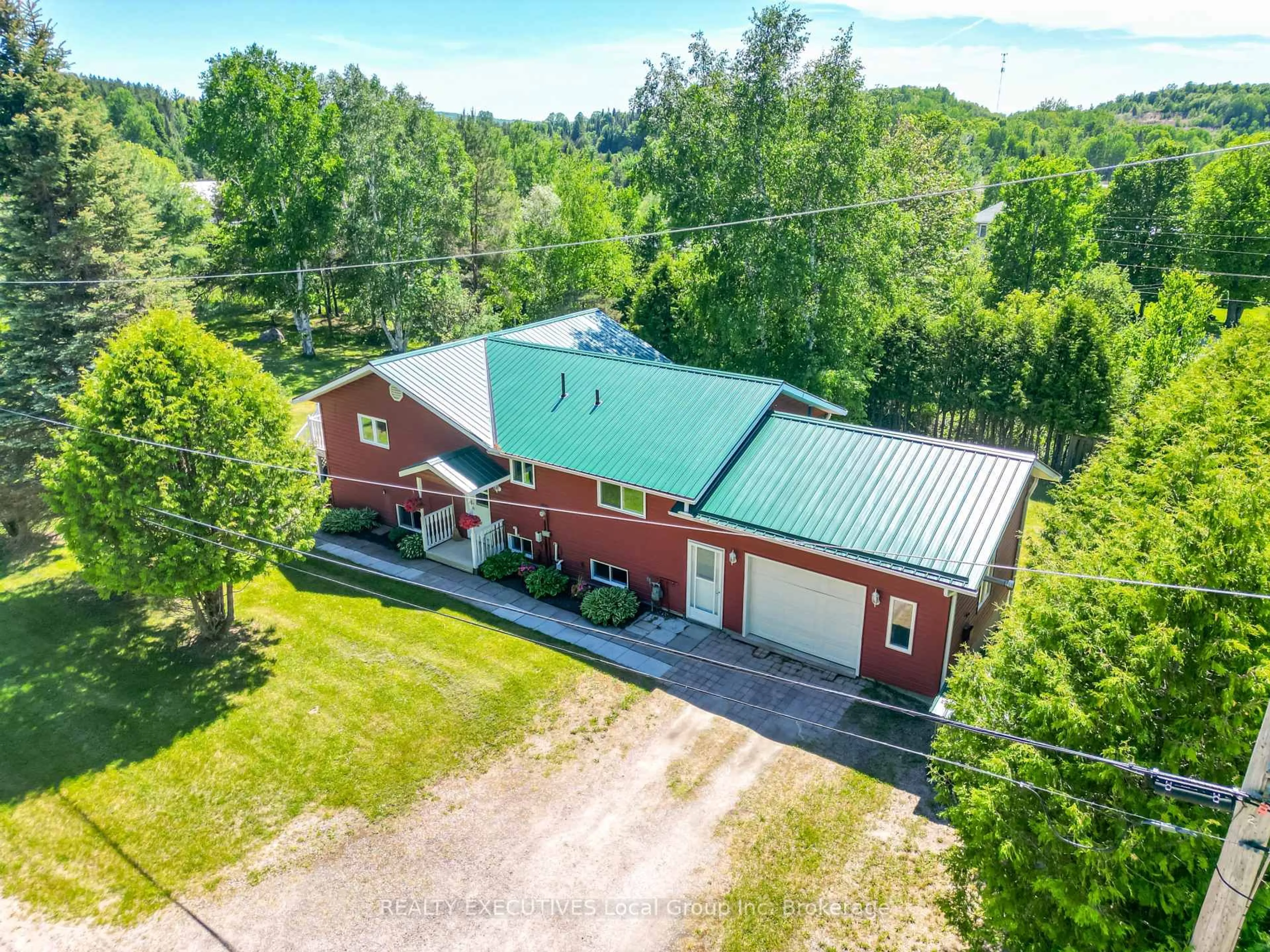 A pic from outside/outdoor area/front of a property/back of a property/a pic from drone, building for 153 Big Bend Ave, Powassan Ontario P0H 1Z0