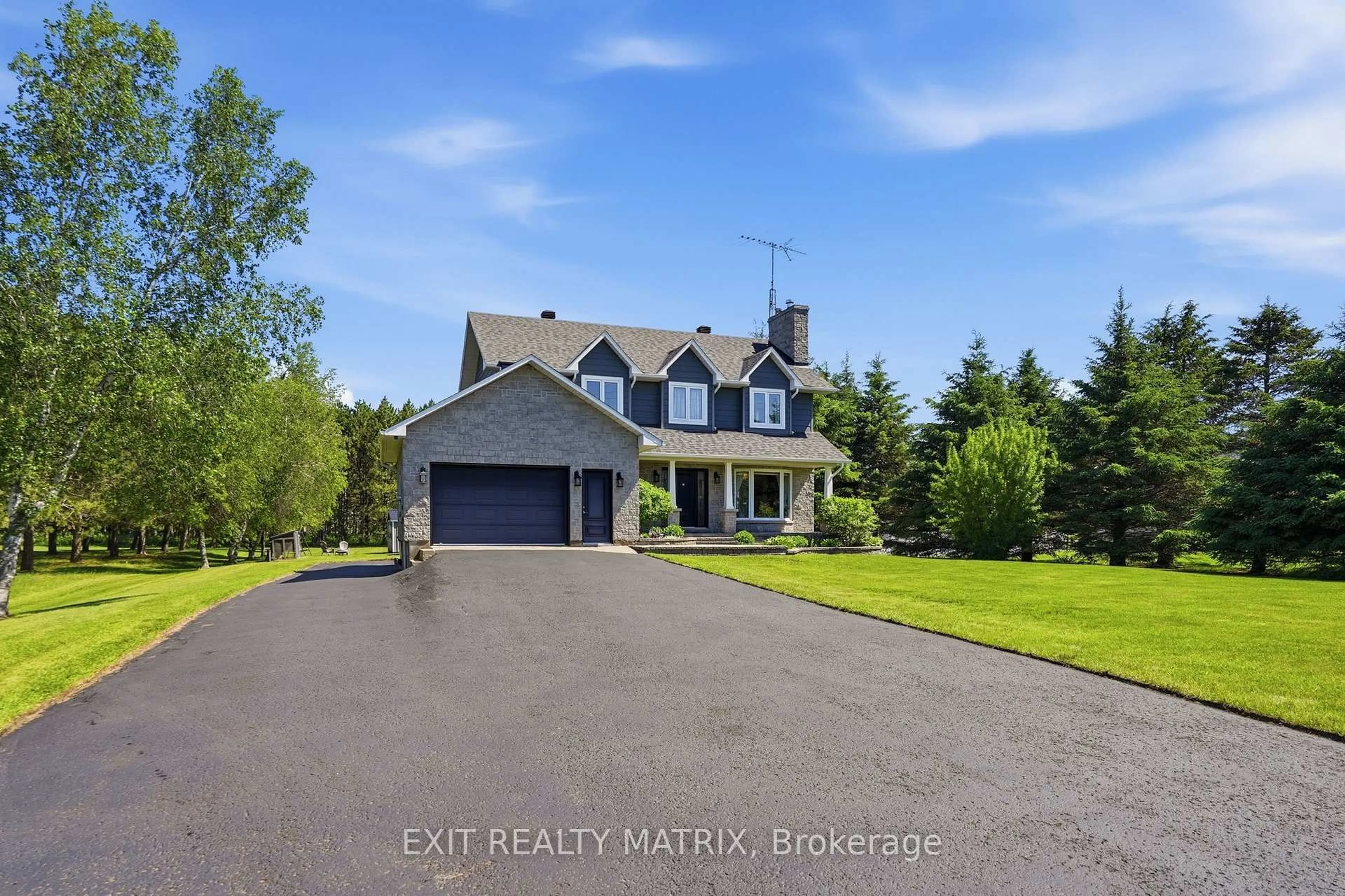 A pic from outside/outdoor area/front of a property/back of a property/a pic from drone, water/lake/river/ocean view for 715 County Rd 10 Rd, Hawkesbury Ontario K0B 1P0