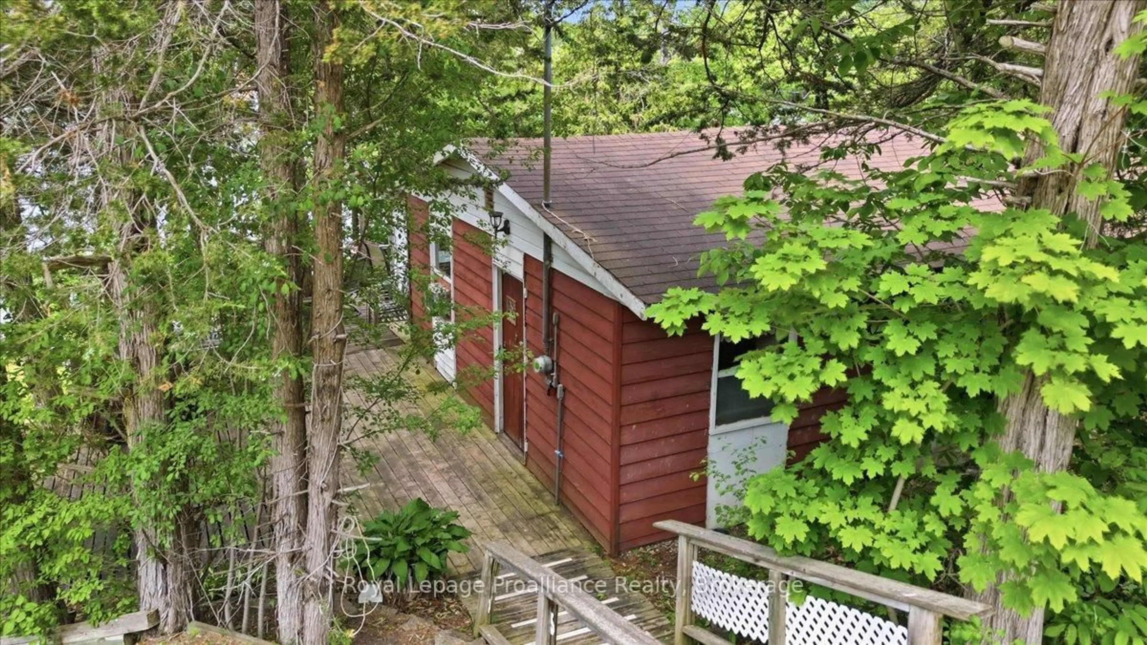 A pic from outside/outdoor area/front of a property/back of a property/a pic from drone, forest/trees view for 398 Haigs Reach Rd, Trent Hills Ontario K0L 1L0