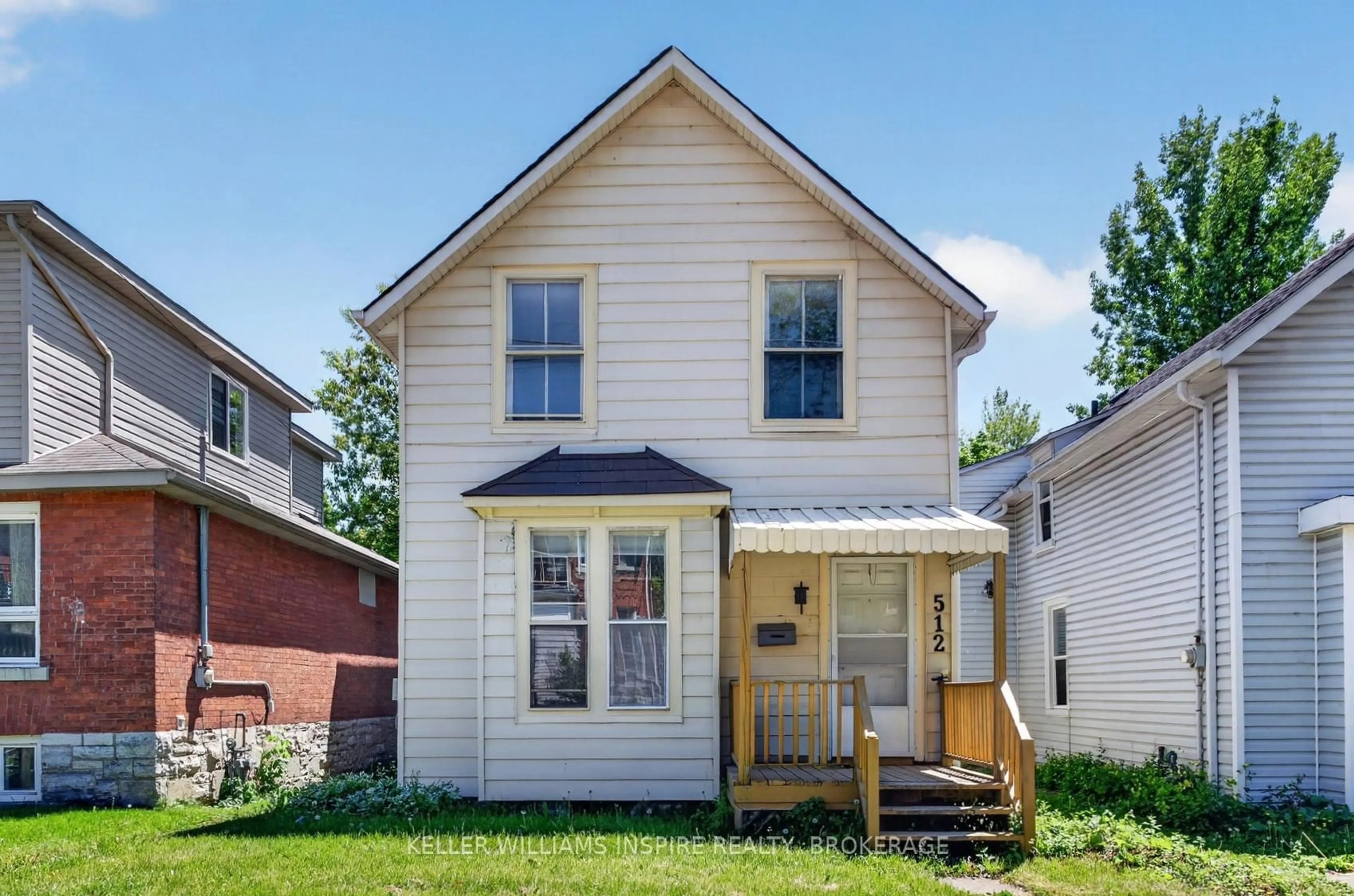 Home with vinyl exterior material, street for 512 Johnson St, Kingston Ontario K7L 1Z8