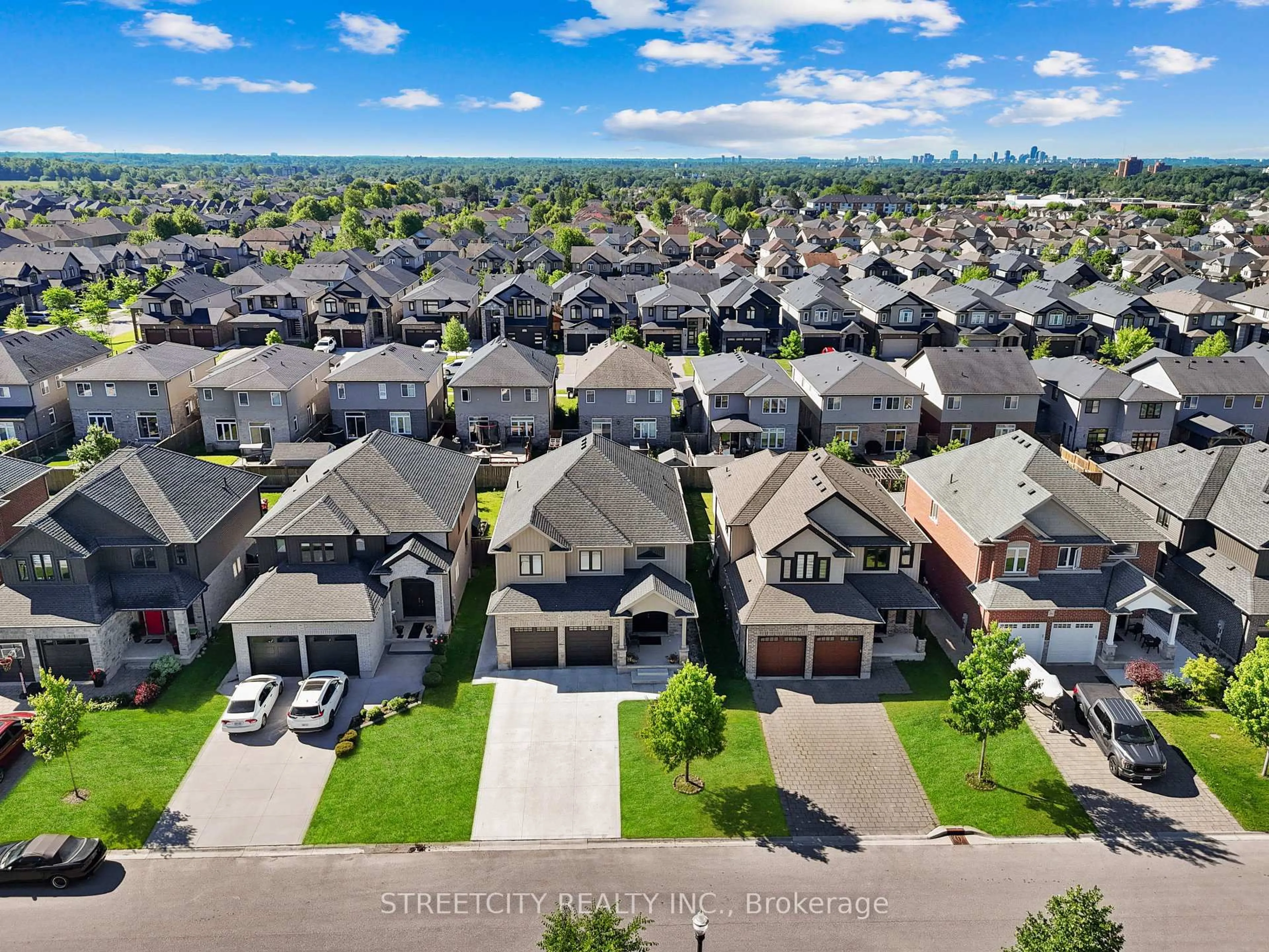 A pic from outside/outdoor area/front of a property/back of a property/a pic from drone, street for 2178 Springridge Dr, London North Ontario N5X 0M3