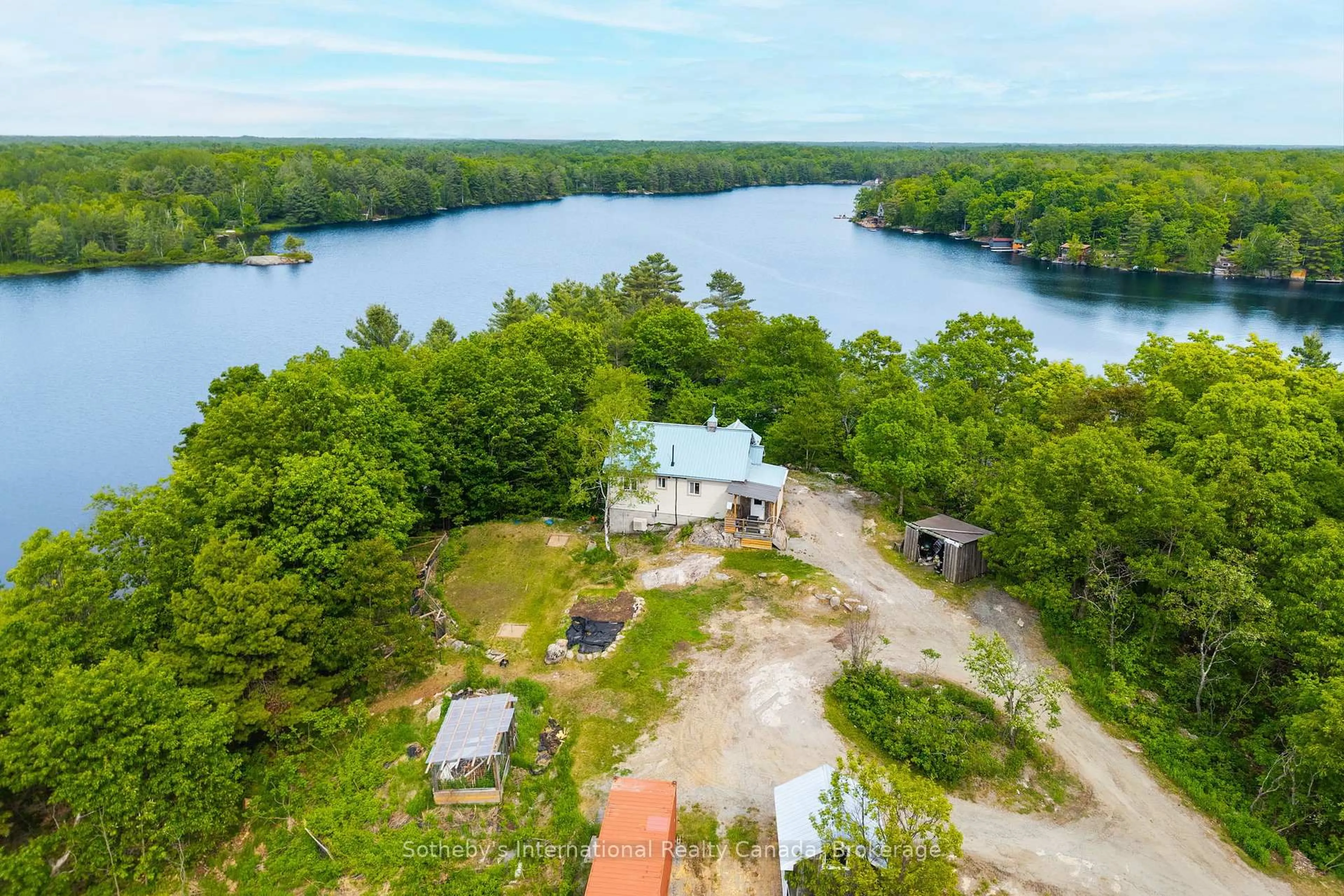 A pic from outside/outdoor area/front of a property/back of a property/a pic from drone, water/lake/river/ocean view for 166 MYERS LAKE Rd, Georgian Bay Ontario P0C 1H0