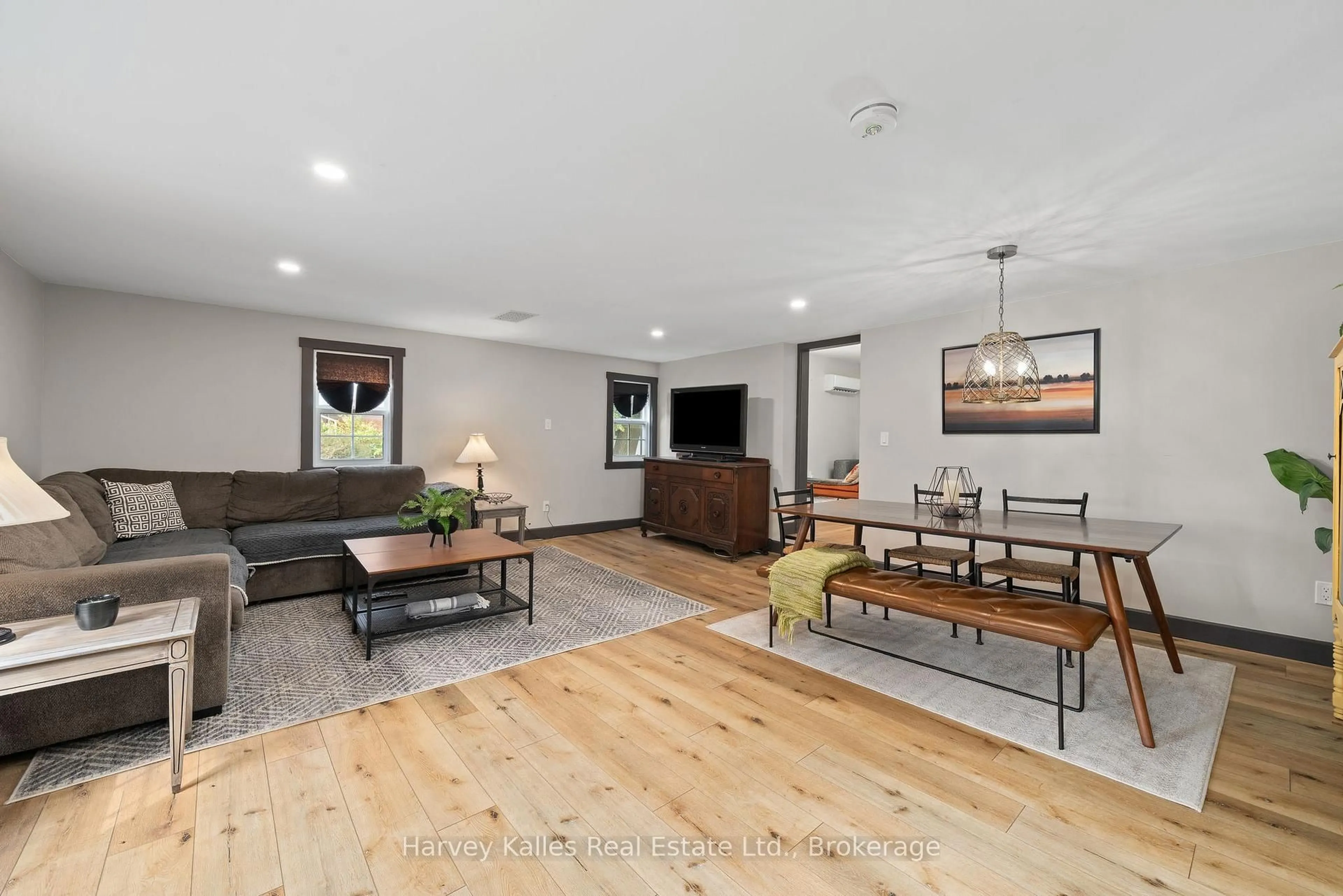 Living room with furniture, wood/laminate floor for 22 DEMILLE St, Prince Edward County Ontario K0K 2T0