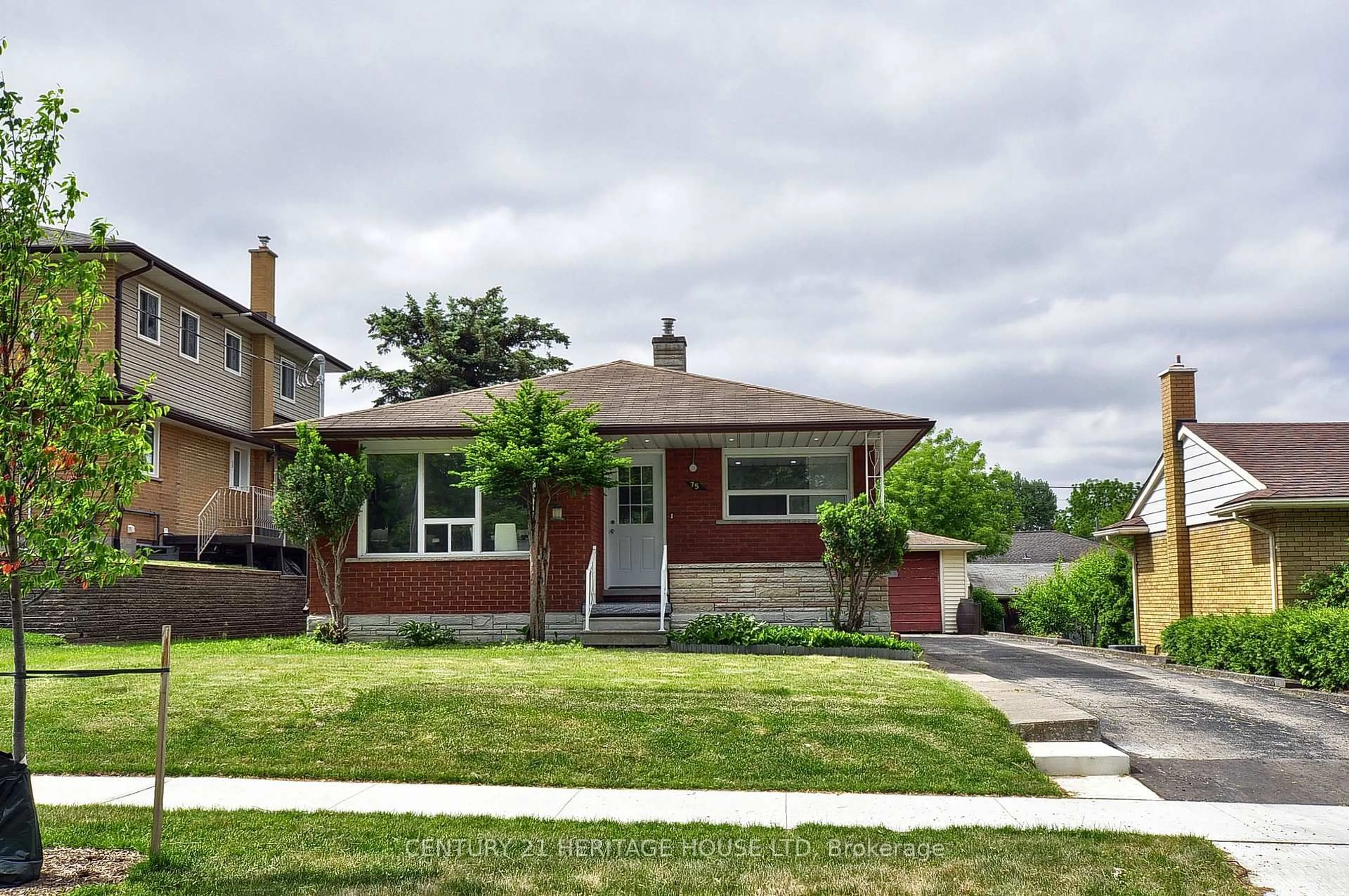 Home with brick exterior material, street for 75 Olympic Dr, Kitchener Ontario N2M 3S7