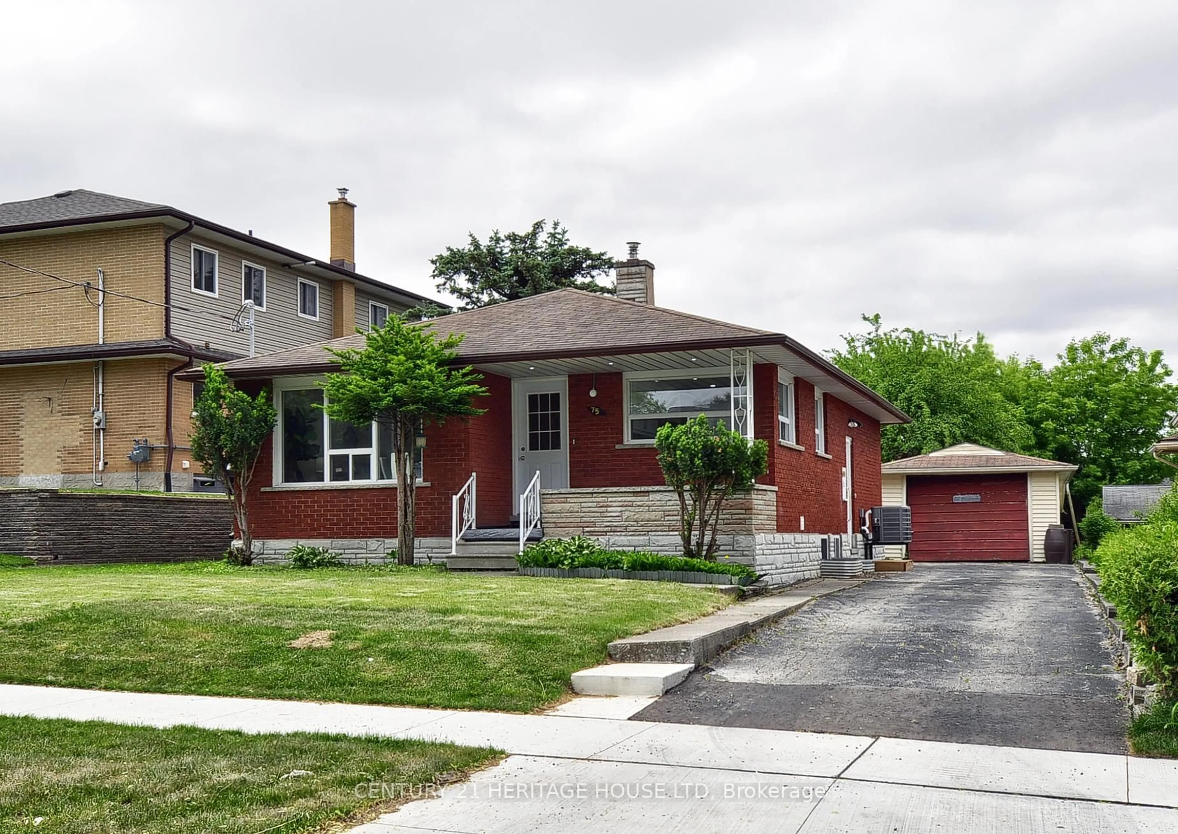 Home with brick exterior material, street for 75 Olympic Dr, Kitchener Ontario N2M 3S7