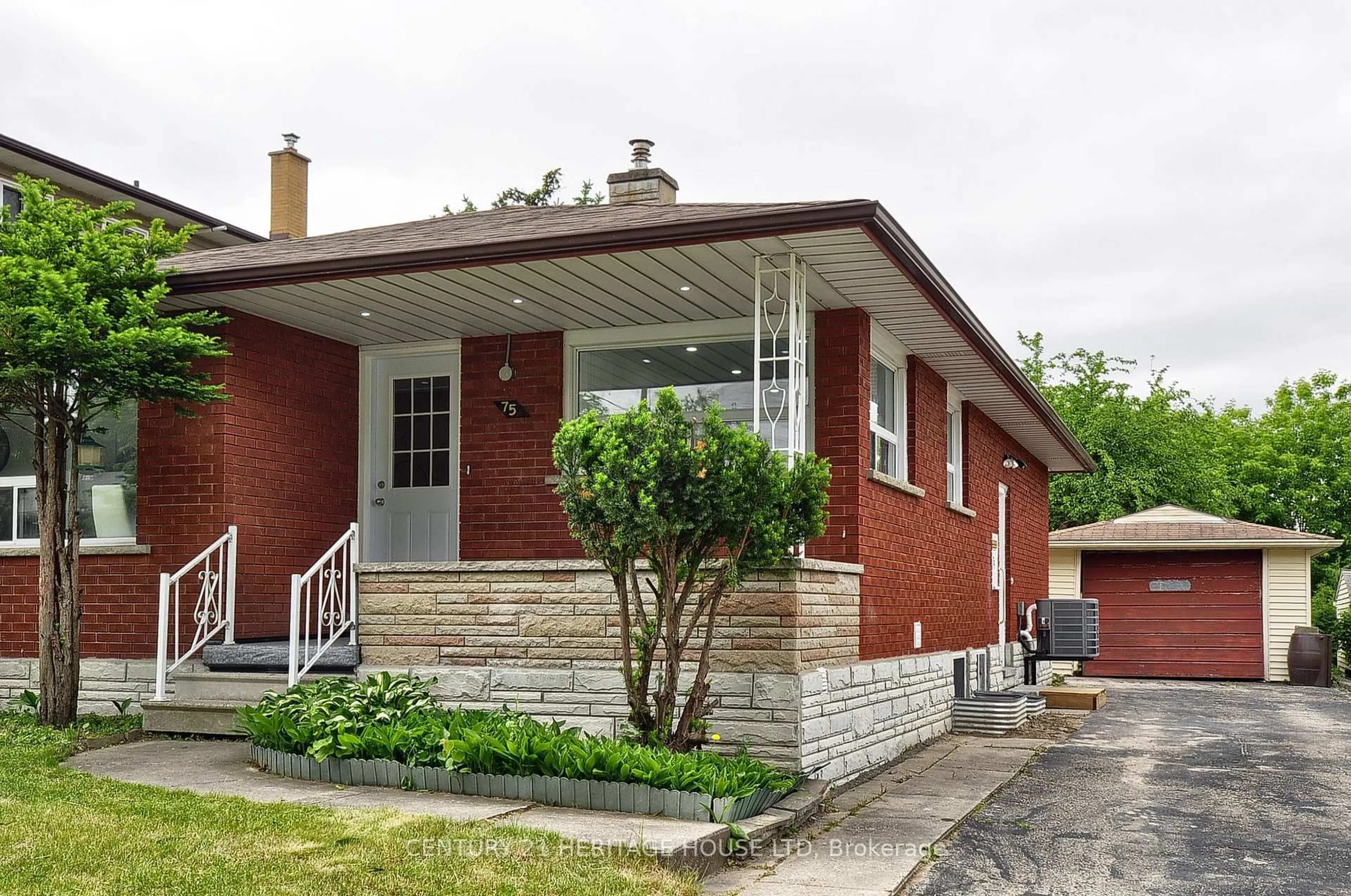 Home with brick exterior material, street for 75 Olympic Dr, Kitchener Ontario N2M 3S7