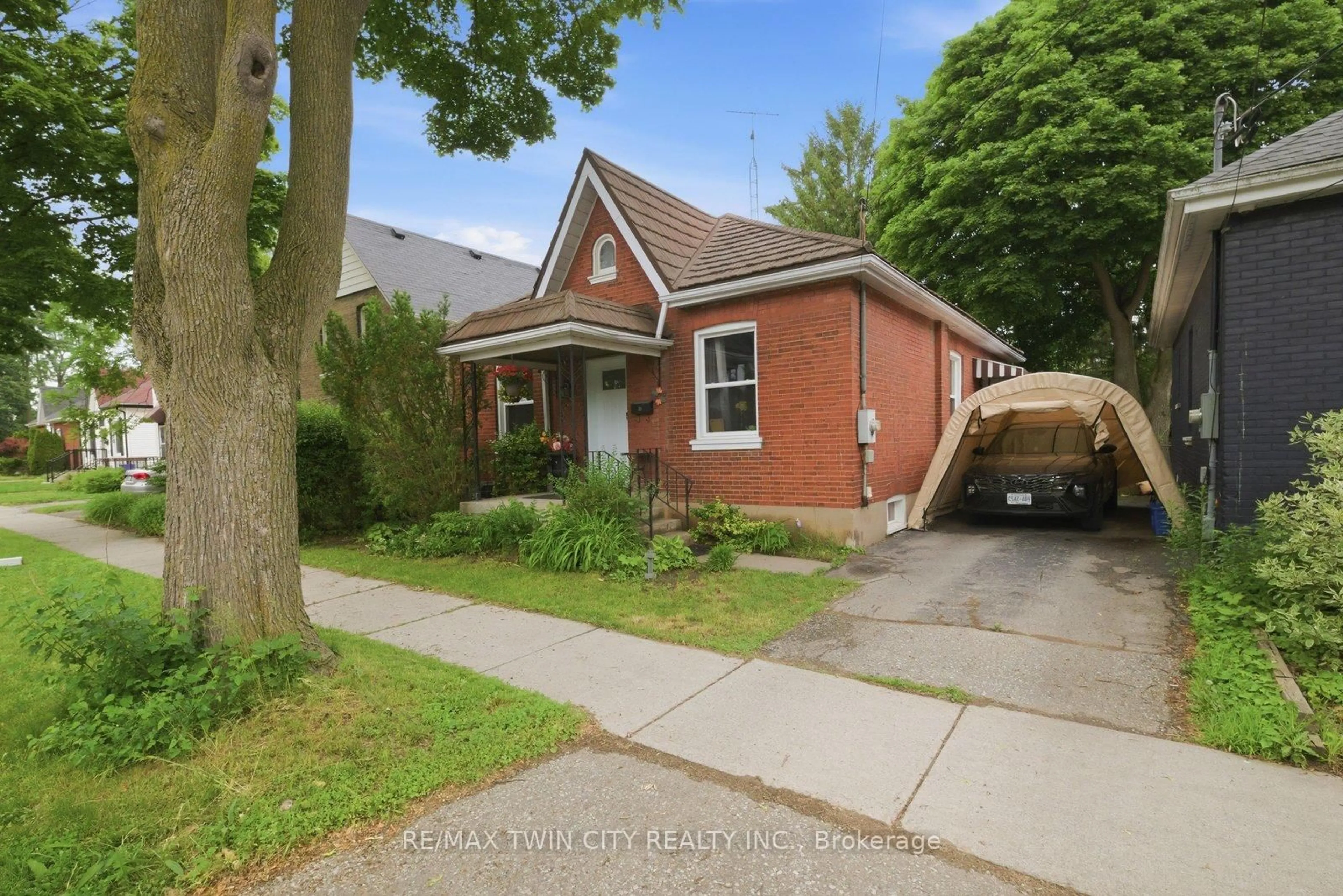 Home with brick exterior material, street for 12 Brunswick St, Brantford Ontario N3T 1E7