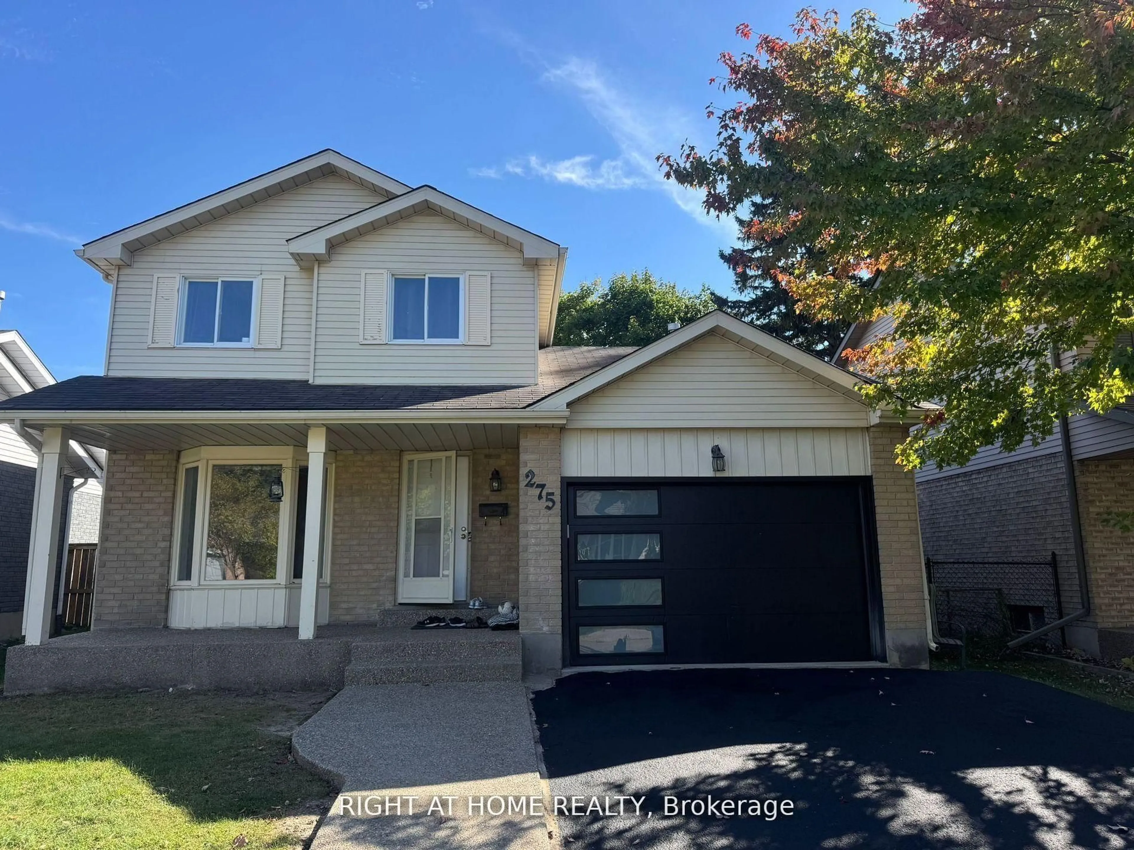 Home with vinyl exterior material, street for 275 Tagge Cres, Kitchener Ontario N2K 3R7
