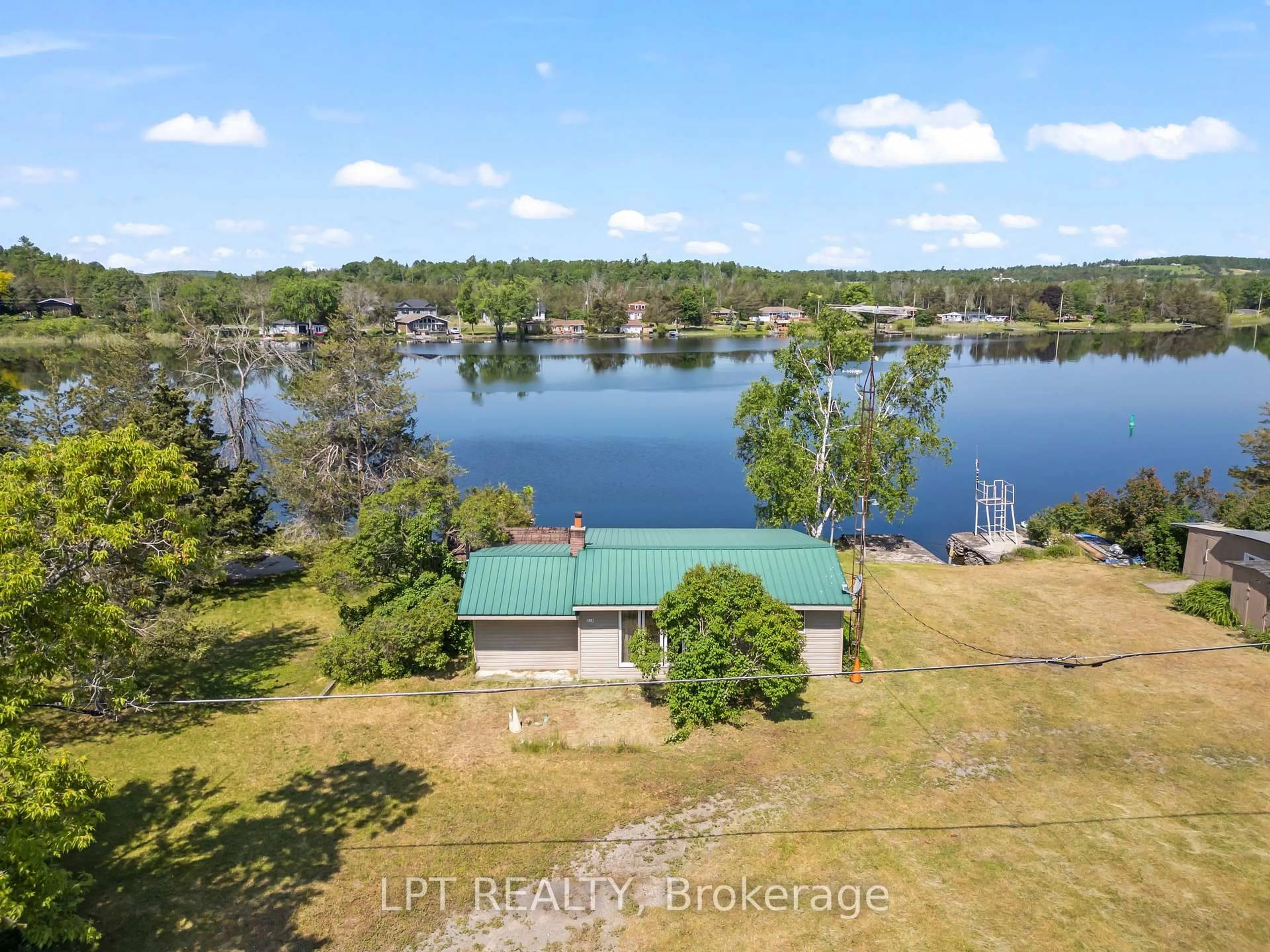 A pic from outside/outdoor area/front of a property/back of a property/a pic from drone, water/lake/river/ocean view for 934 County 38 Rd, Trent Hills Ontario K0L 1L0