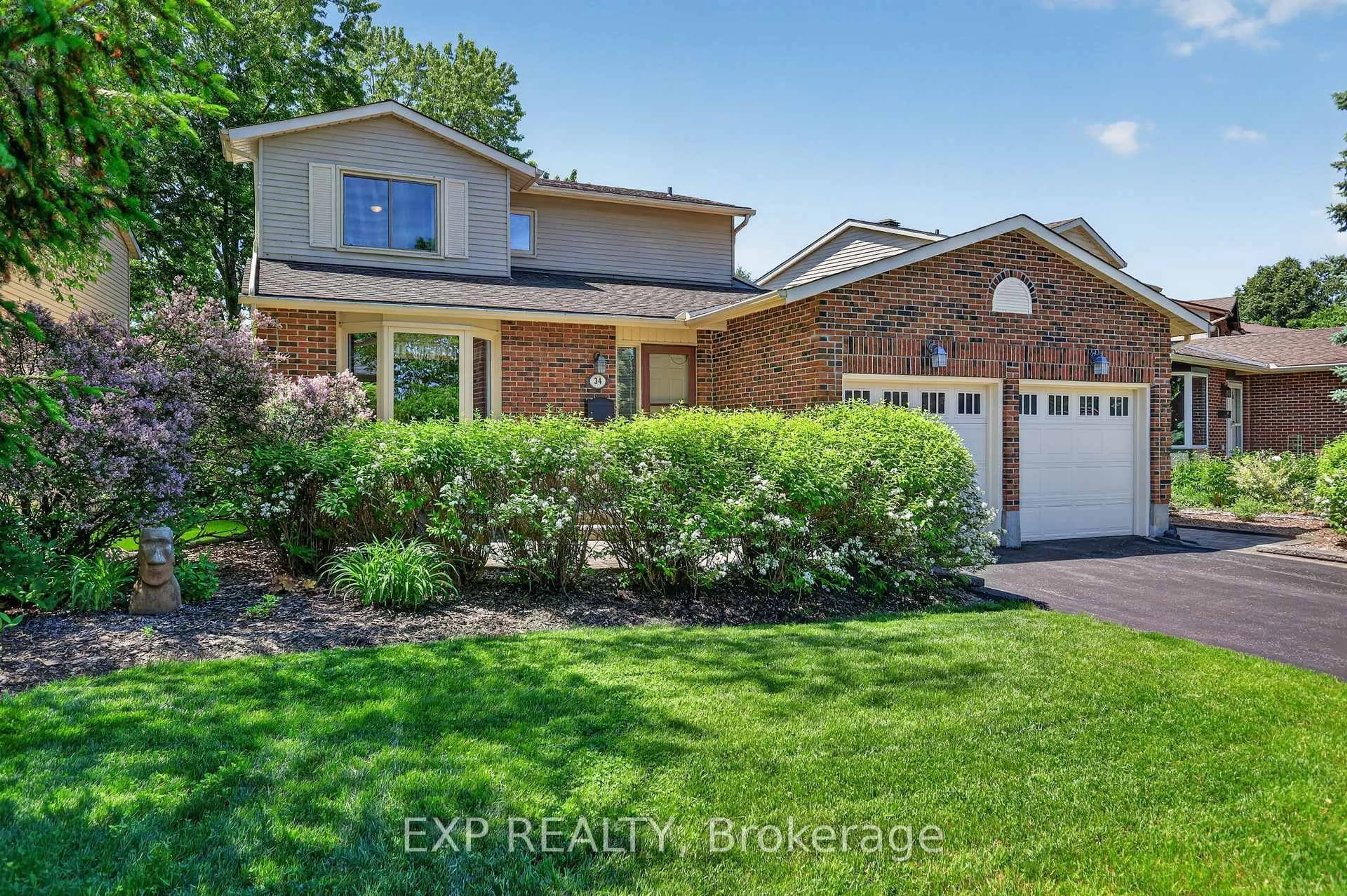 Home with brick exterior material, unknown for 34 Four Seasons Dr, Ottawa Ontario K2E 7P8