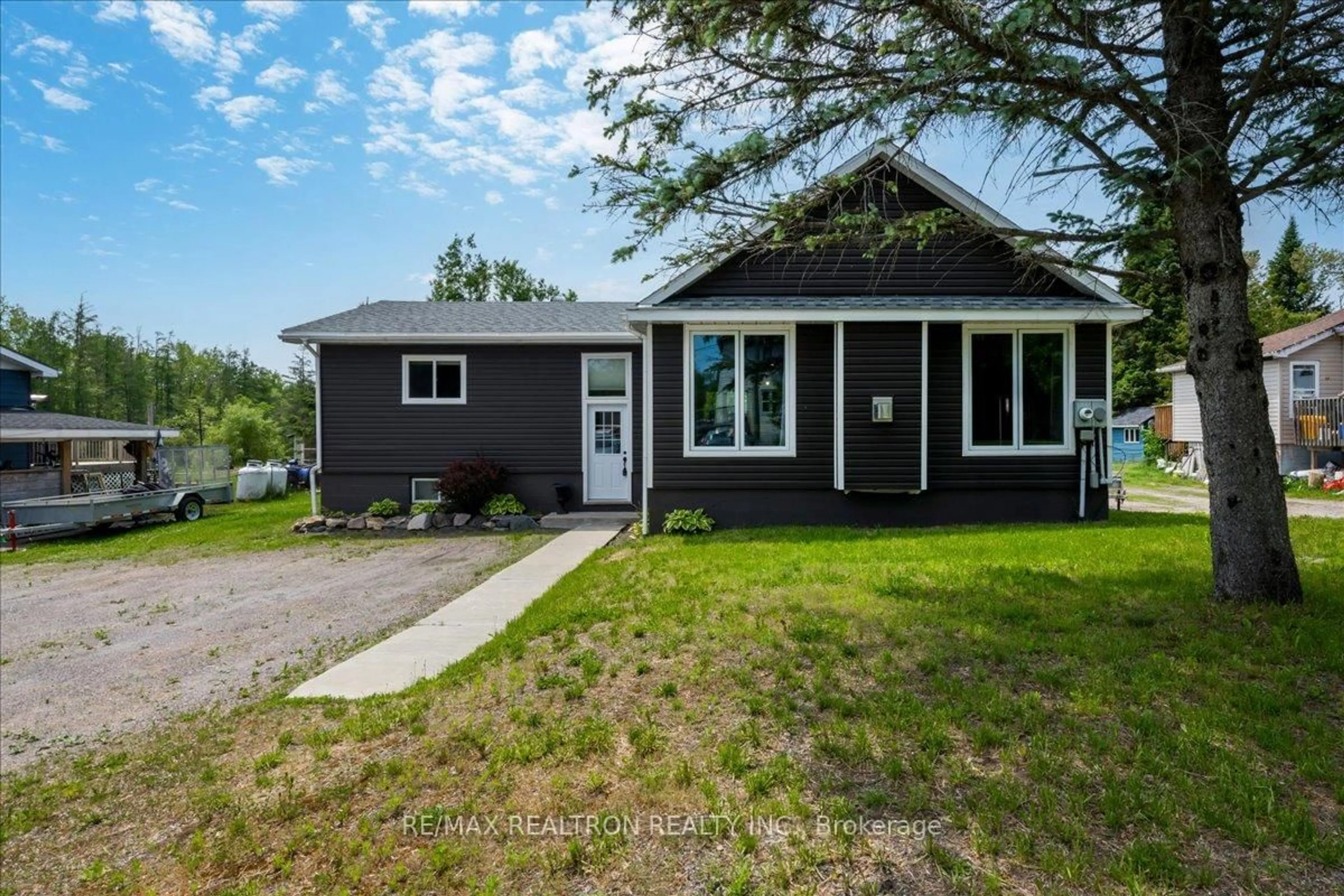 Home with vinyl exterior material, street for 45 Joseph St, Georgian Bay Ontario P0C 1H0