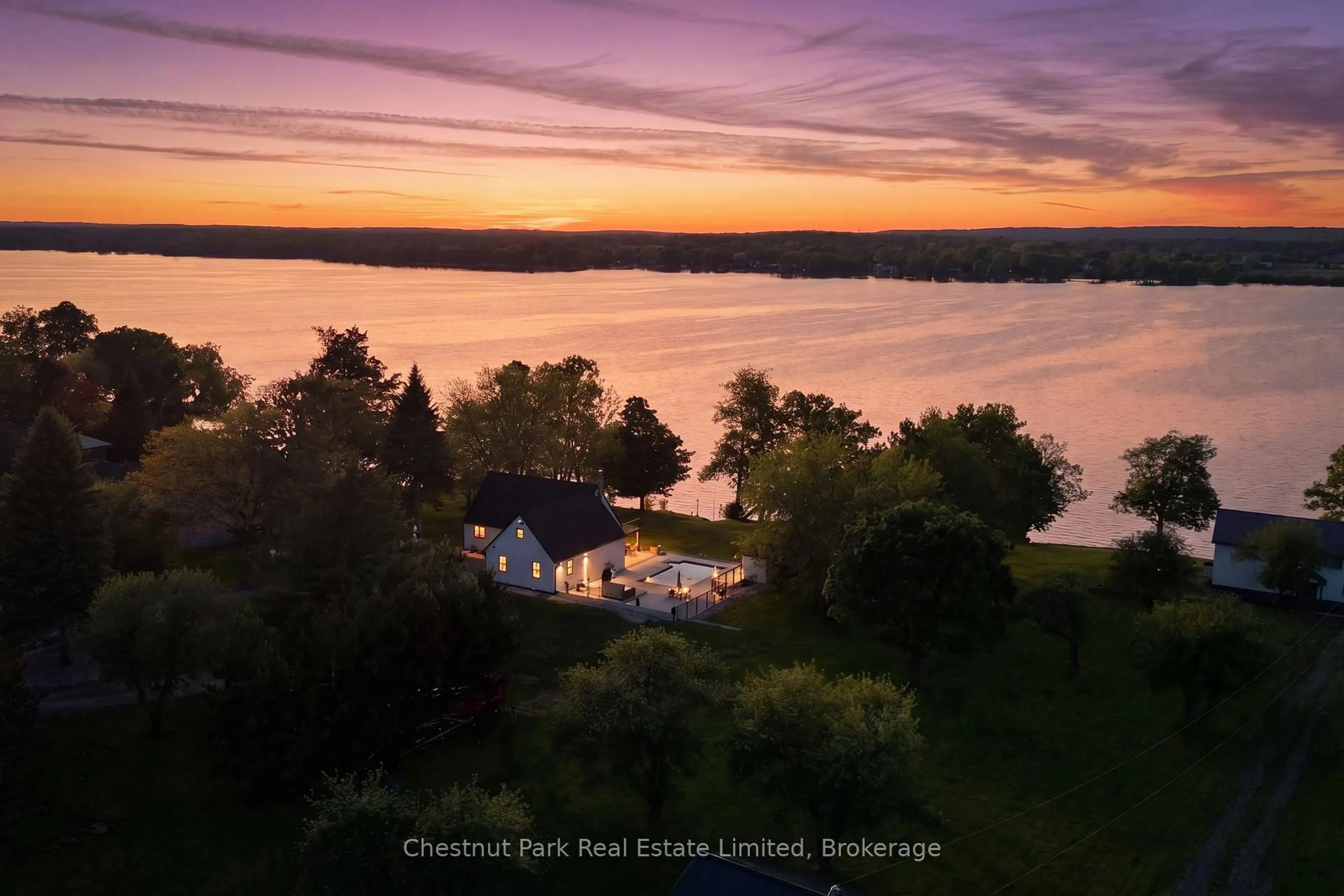 A pic from outside/outdoor area/front of a property/back of a property/a pic from drone, water/lake/river/ocean view for 1424 County Rd 3, Prince Edward County Ontario K0K 1L0