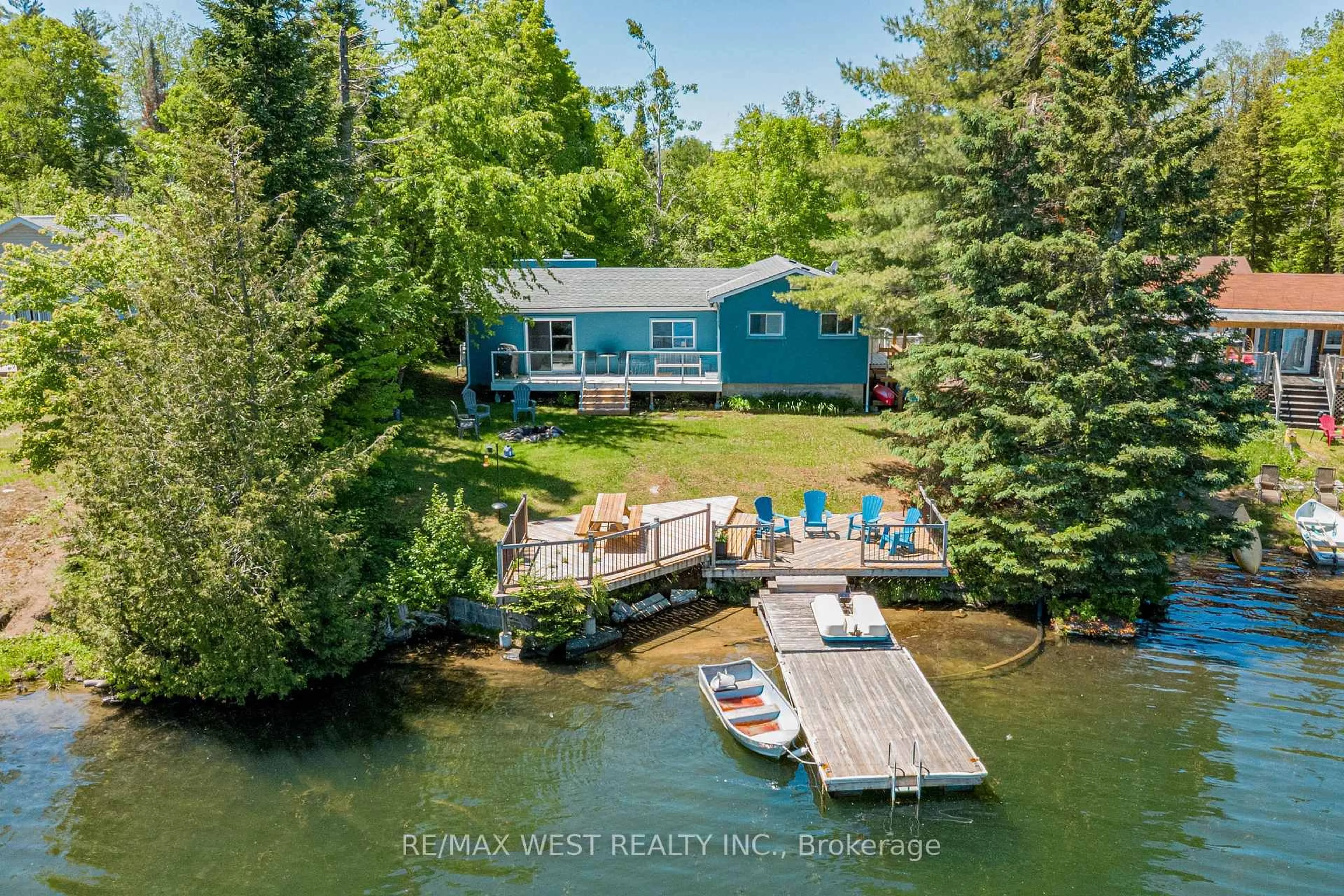 A pic from outside/outdoor area/front of a property/back of a property/a pic from drone, water/lake/river/ocean view for 1432 Clement Lake Rd, Highlands East Ontario K0L 3C0