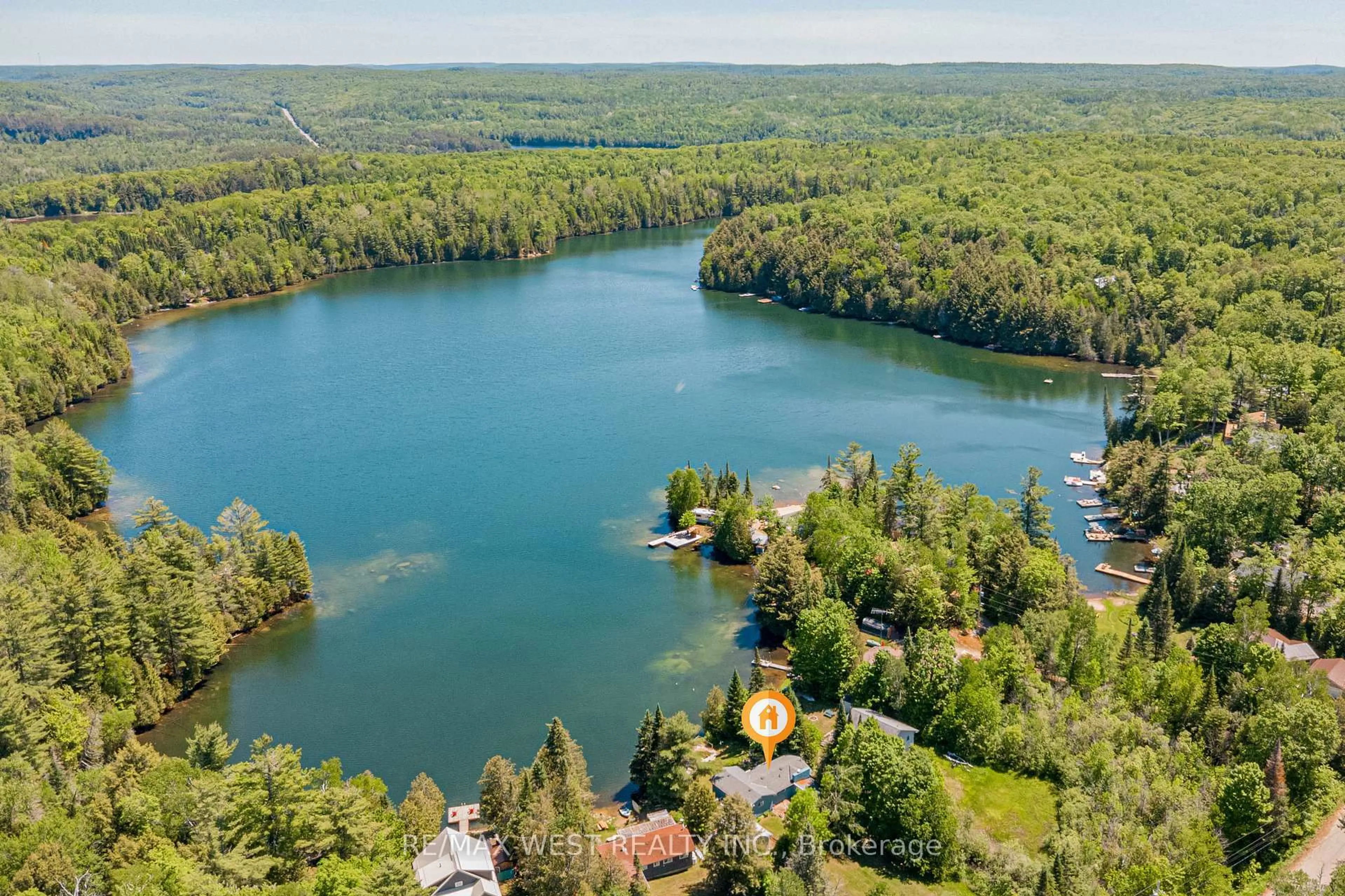 A pic from outside/outdoor area/front of a property/back of a property/a pic from drone, water/lake/river/ocean view for 1432 Clement Lake Rd, Highlands East Ontario K0L 3C0