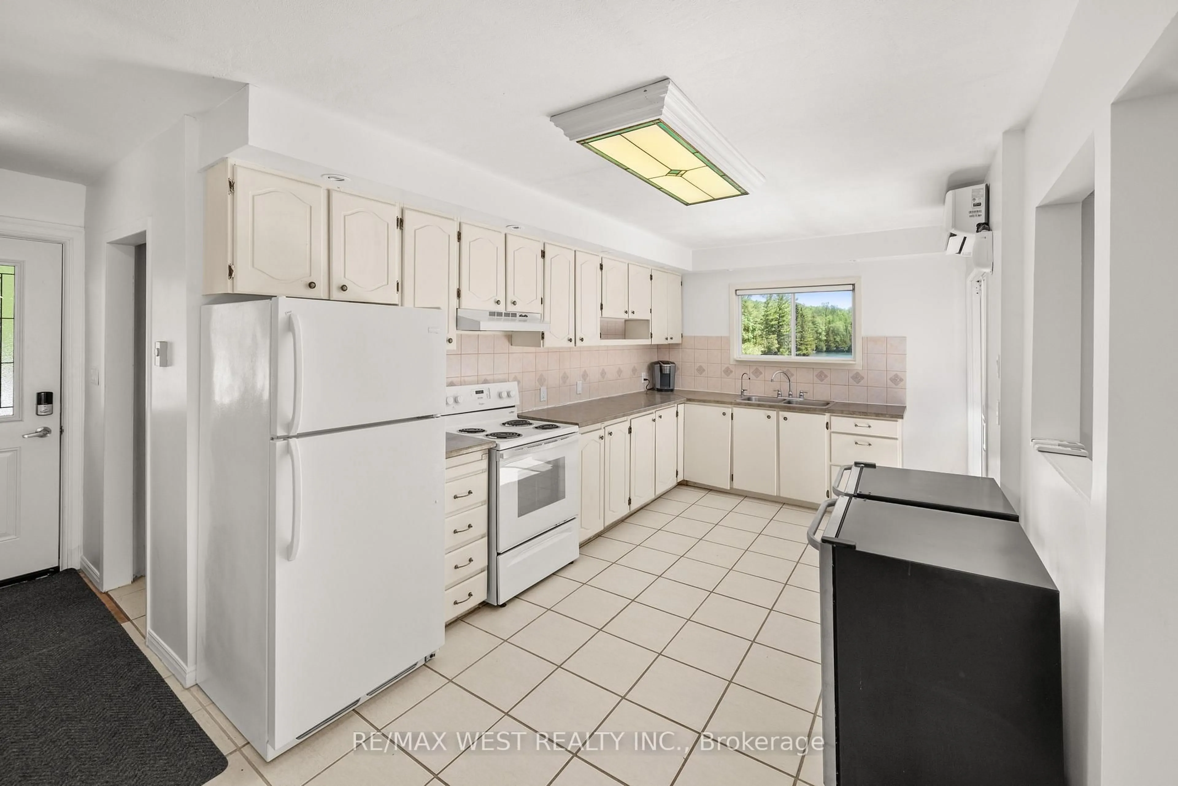 Standard kitchen, ceramic/tile floor for 1432 Clement Lake Rd, Highlands East Ontario K0L 3C0