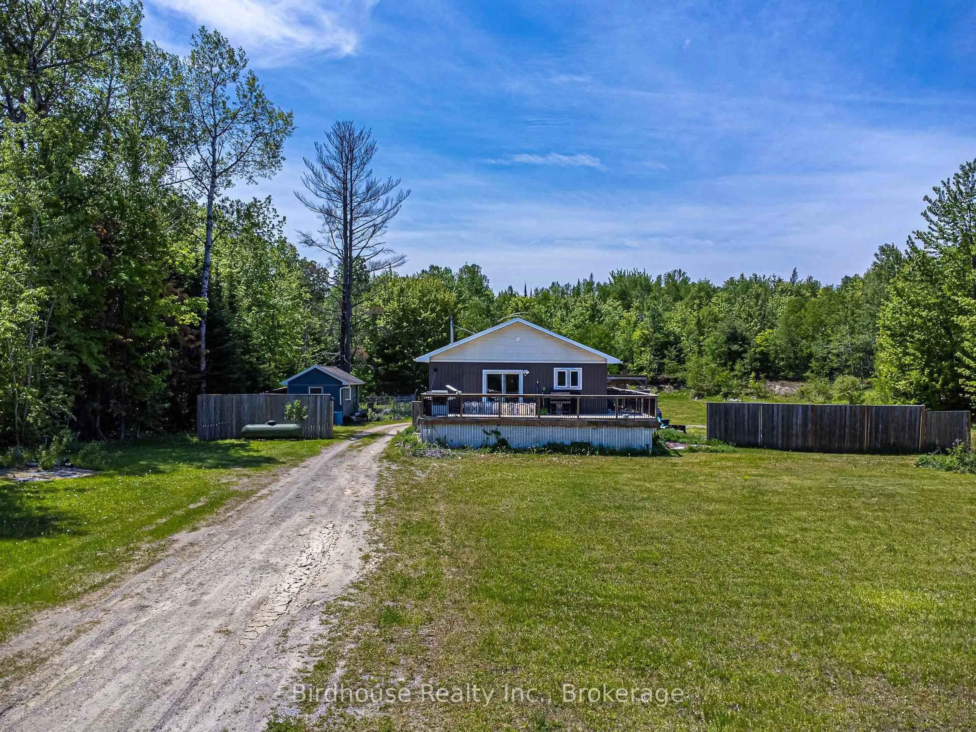 A pic from outside/outdoor area/front of a property/back of a property/a pic from drone, water/lake/river/ocean view for 3399 Gelert Rd, Minden Hills Ontario K0M 2K0