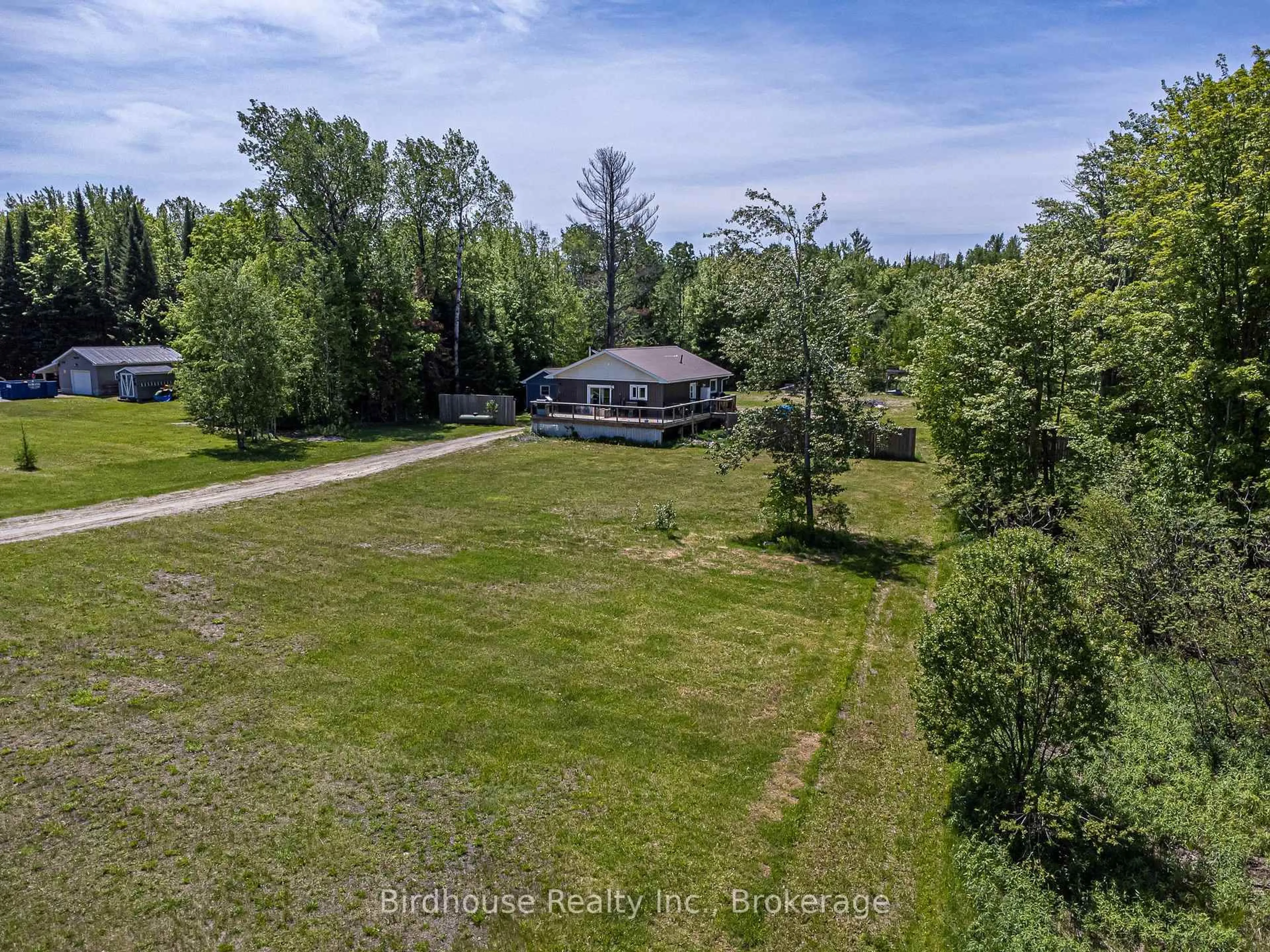 A pic from outside/outdoor area/front of a property/back of a property/a pic from drone, water/lake/river/ocean view for 3399 Gelert Rd, Minden Hills Ontario K0M 2K0