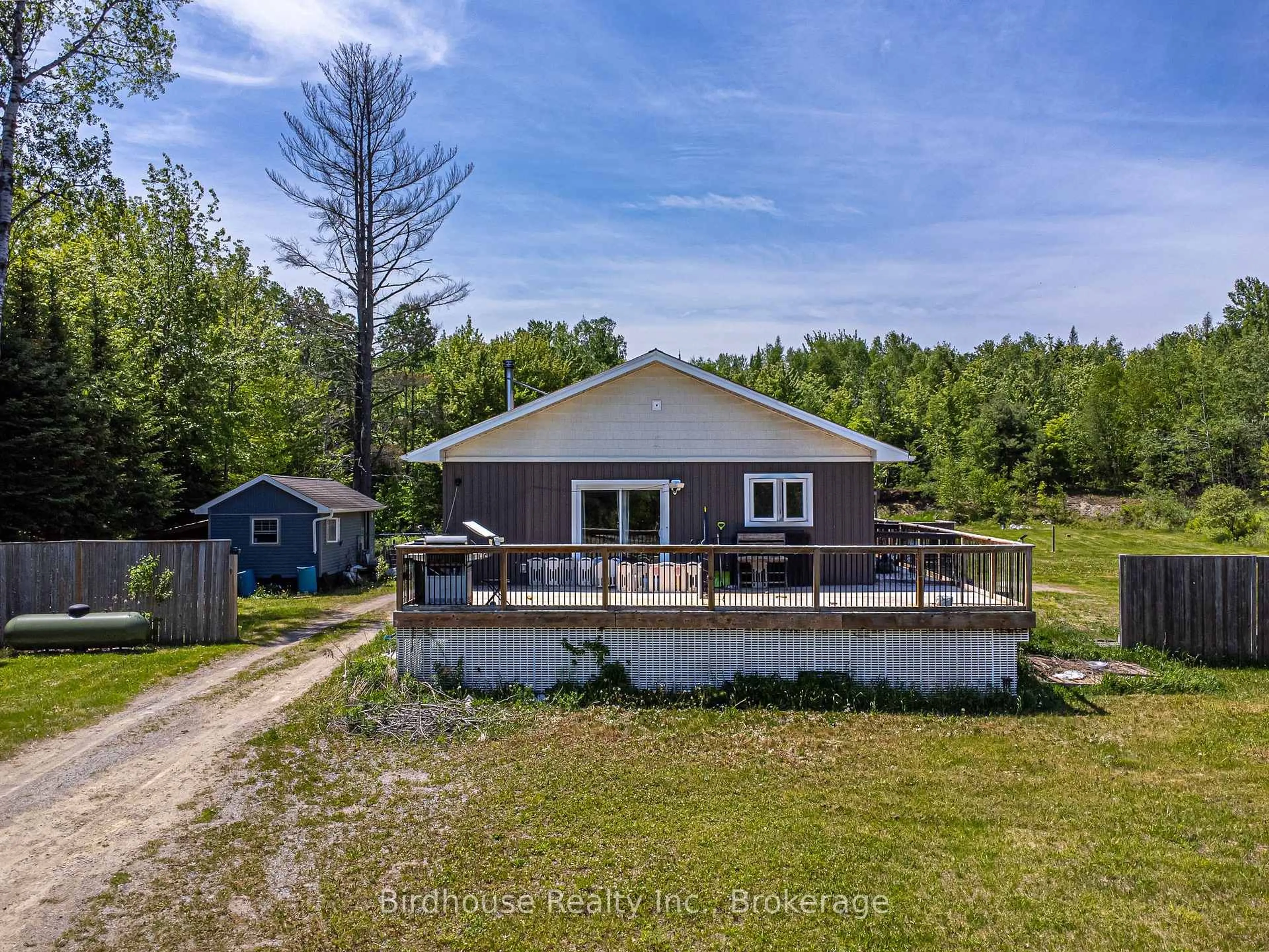 A pic from outside/outdoor area/front of a property/back of a property/a pic from drone, water/lake/river/ocean view for 3399 Gelert Rd, Minden Hills Ontario K0M 2K0