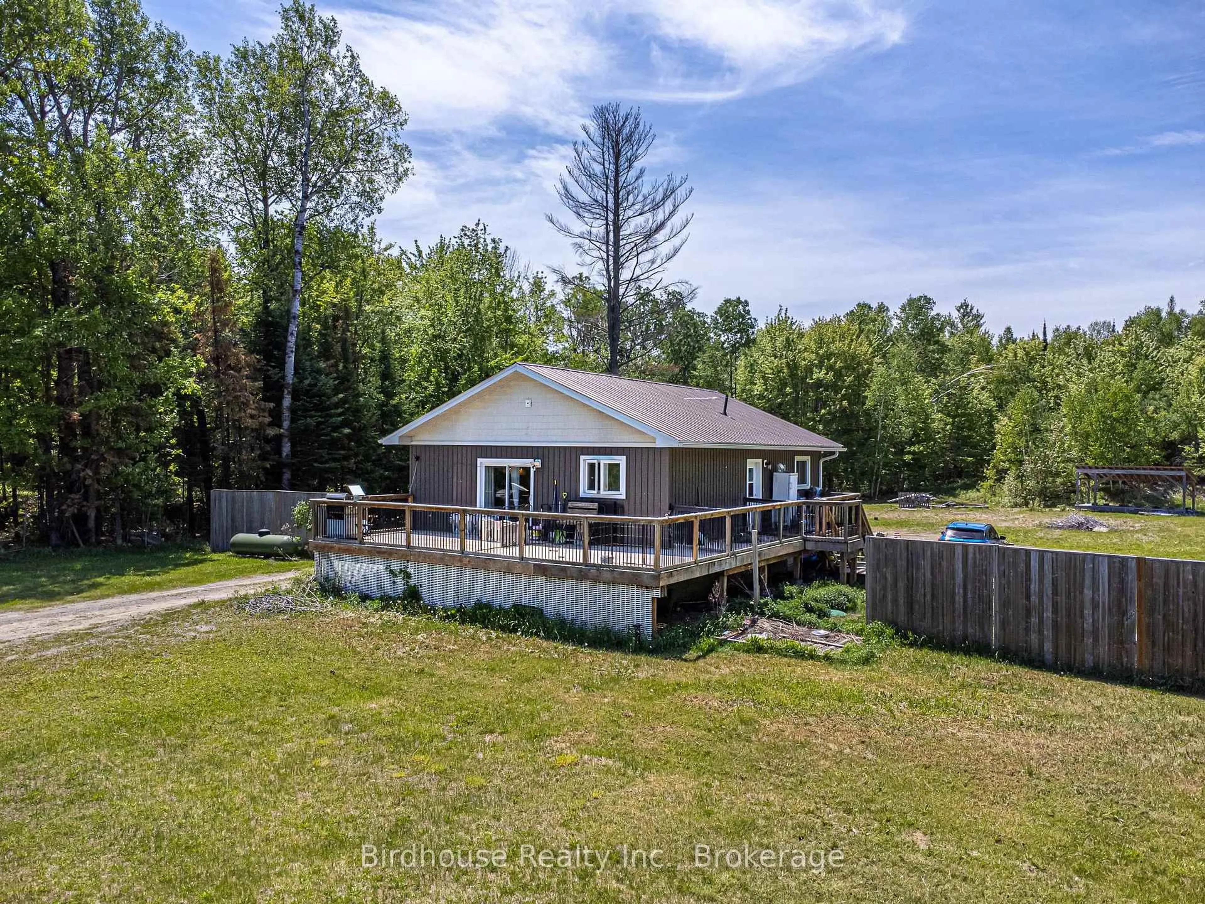 A pic from outside/outdoor area/front of a property/back of a property/a pic from drone, water/lake/river/ocean view for 3399 Gelert Rd, Minden Hills Ontario K0M 2K0