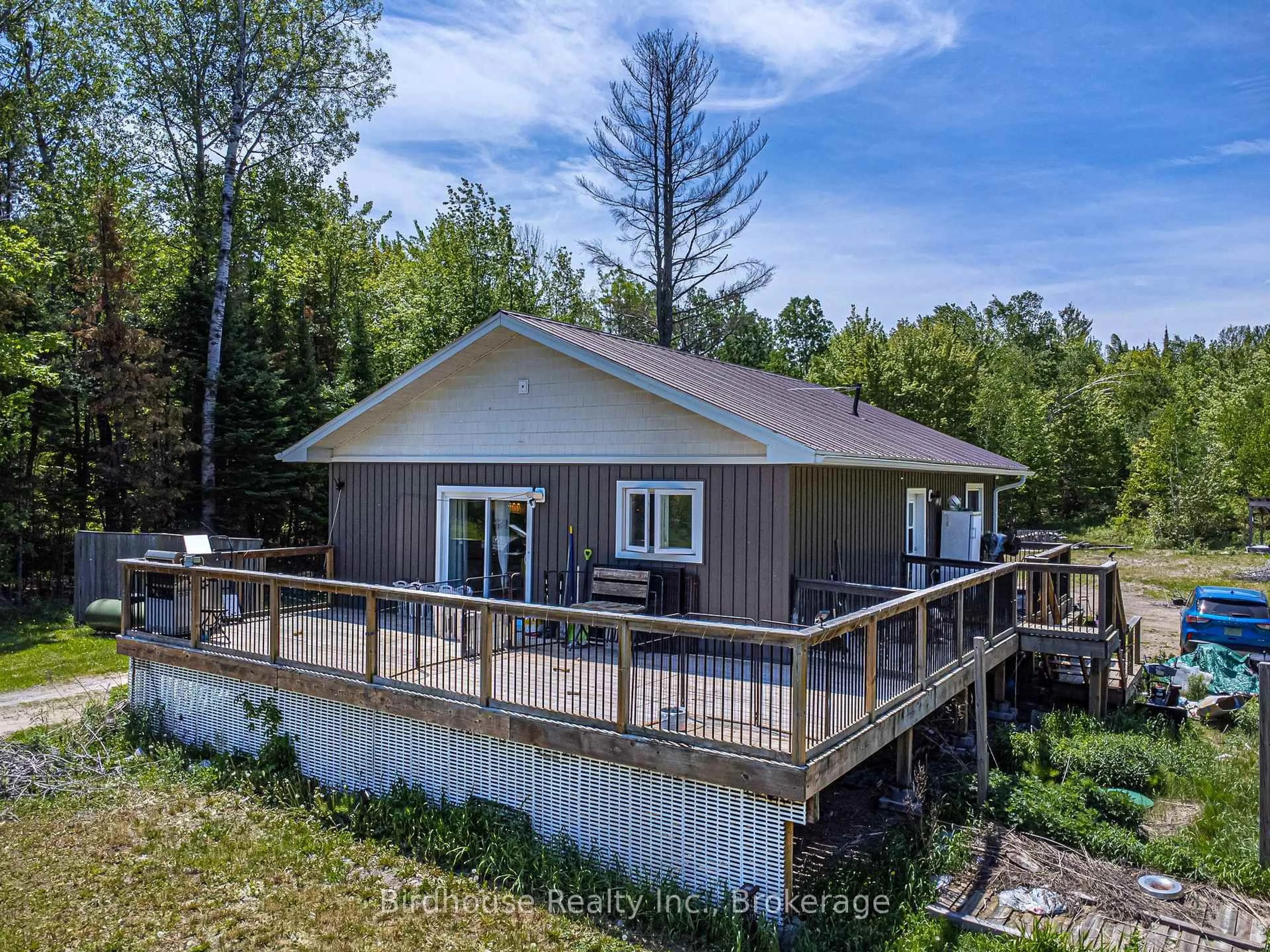 A pic from outside/outdoor area/front of a property/back of a property/a pic from drone, water/lake/river/ocean view for 3399 Gelert Rd, Minden Hills Ontario K0M 2K0