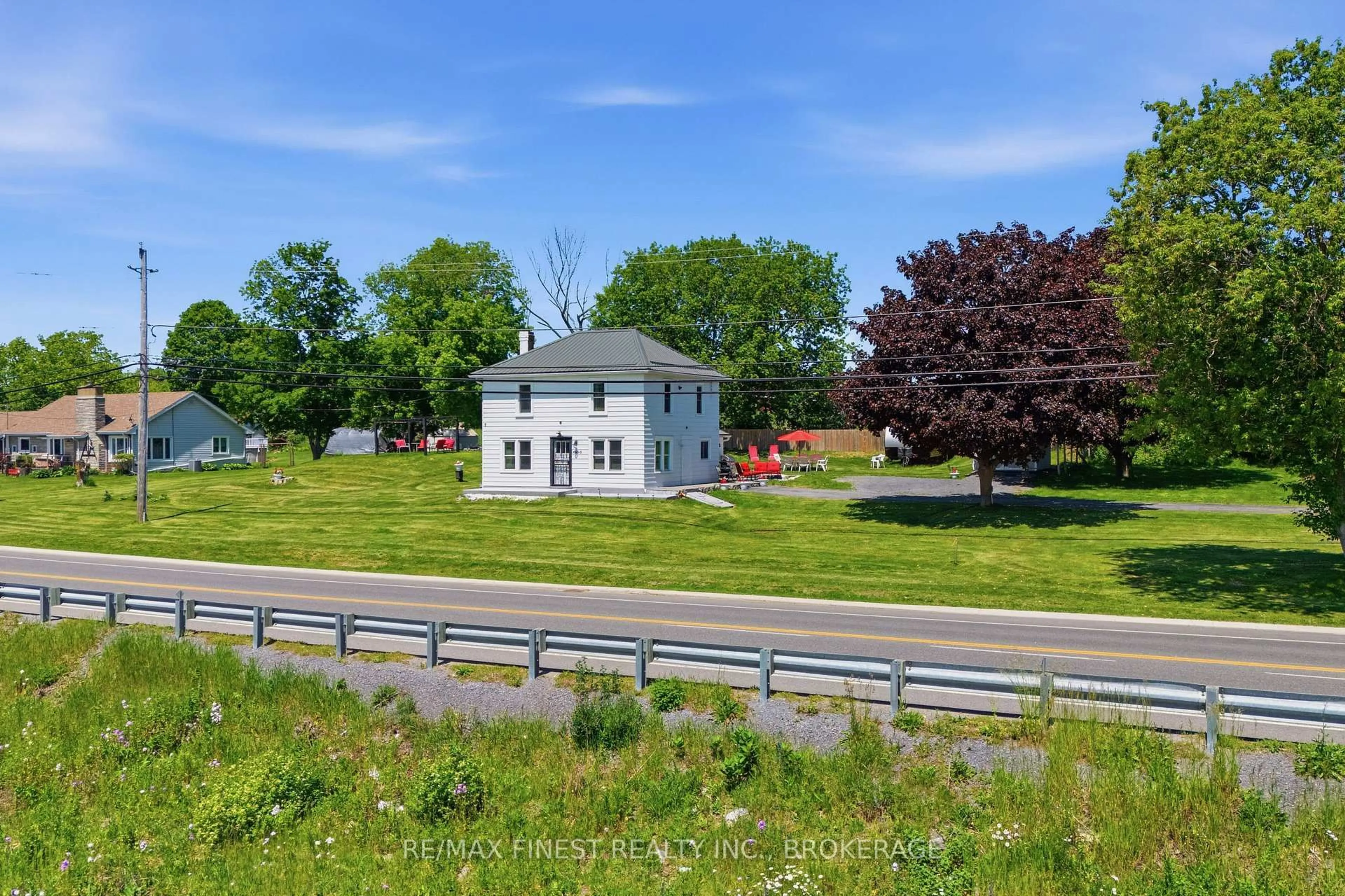 A pic from outside/outdoor area/front of a property/back of a property/a pic from drone, street for 4669 Bath Rd, Bath Ontario K0H 1G0