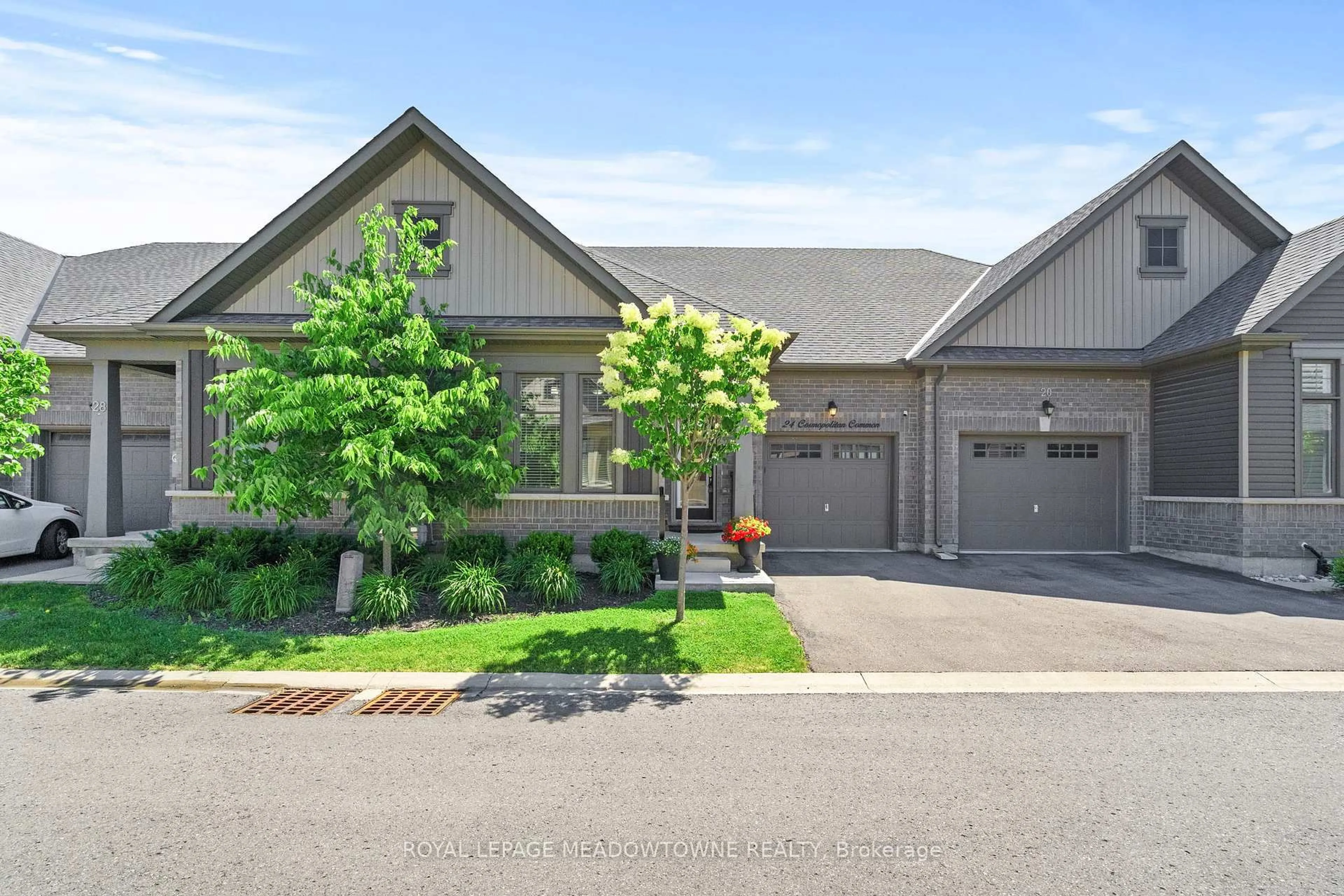 Home with brick exterior material, street for 24 Cosmopolitan Common, St. Catharines Ontario L2M 0B8