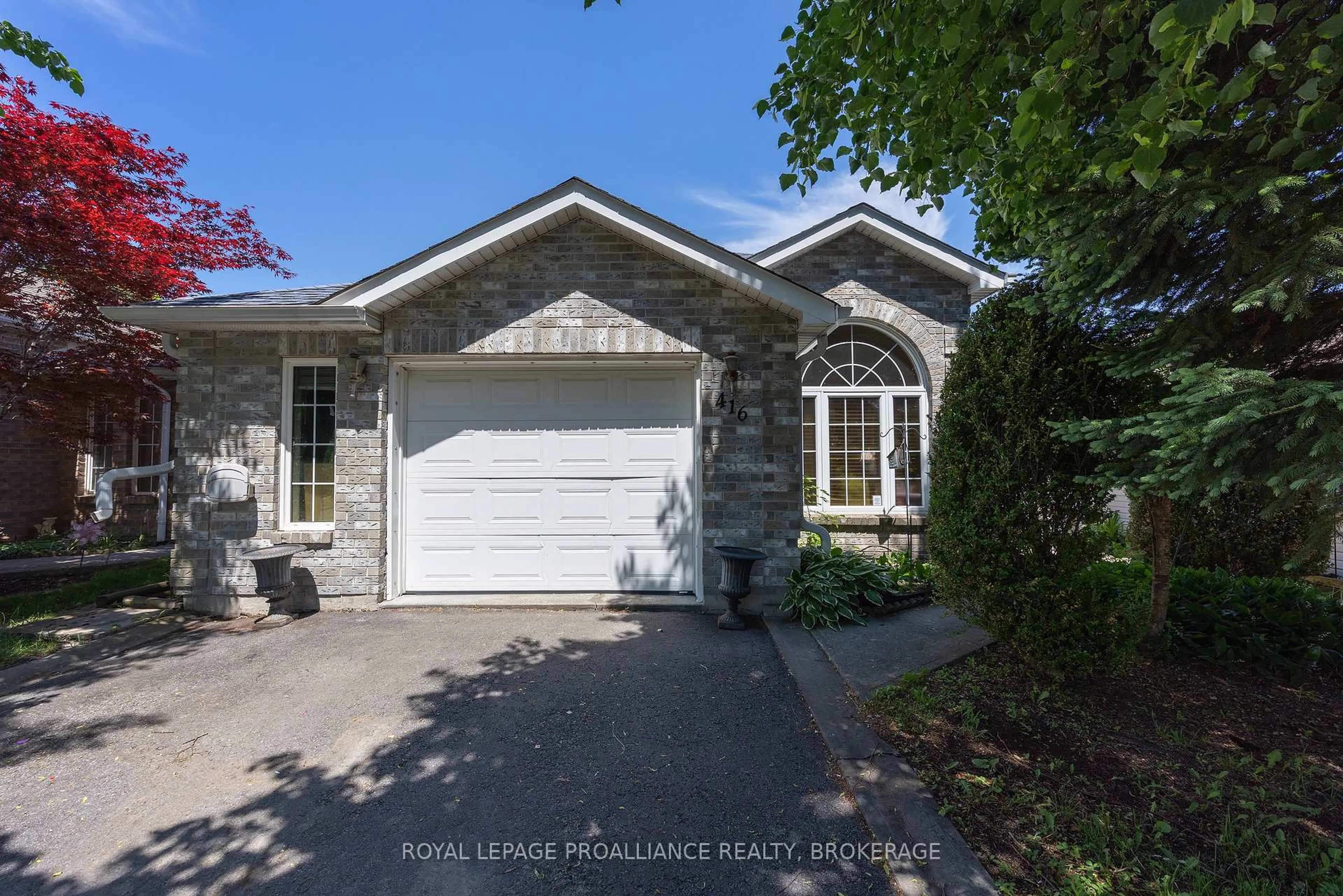 Home with vinyl exterior material, street for 416 Dolshire St, Kingston Ontario K7M 9B4