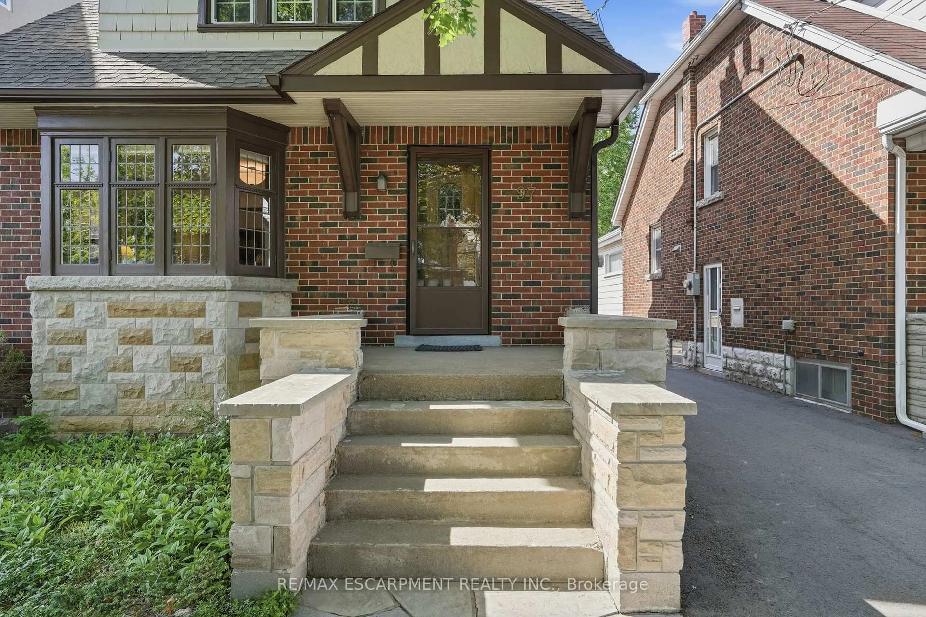 Home with brick exterior material, street for 97 Cline Ave, Hamilton Ontario L8S 3Z5