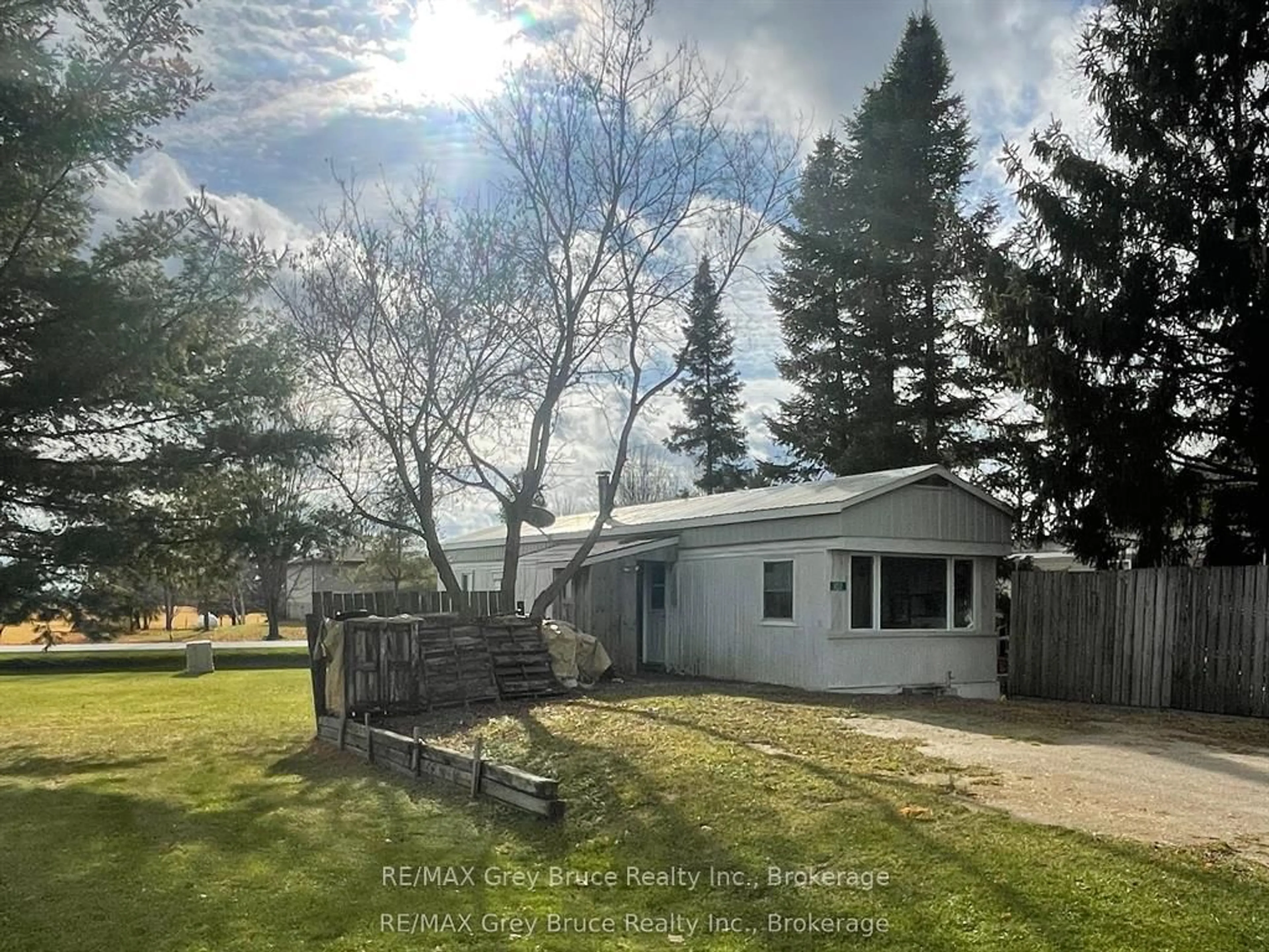 A pic from outside/outdoor area/front of a property/back of a property/a pic from drone, unknown for 102 Grace St, Georgian Bluffs Ontario N0H 2N0