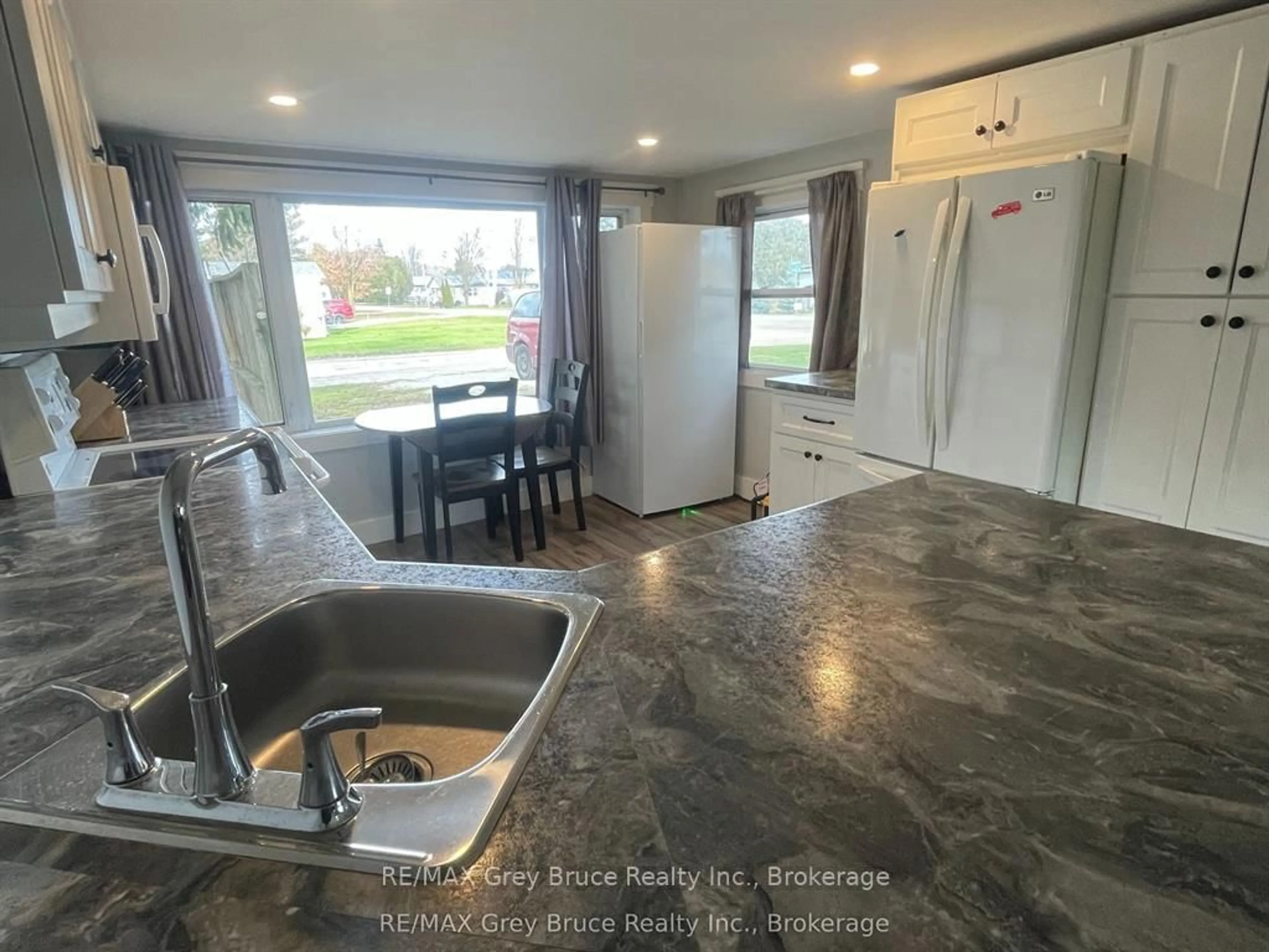 Open concept kitchen, ceramic/tile floor for 102 Grace St, Georgian Bluffs Ontario N0H 2N0