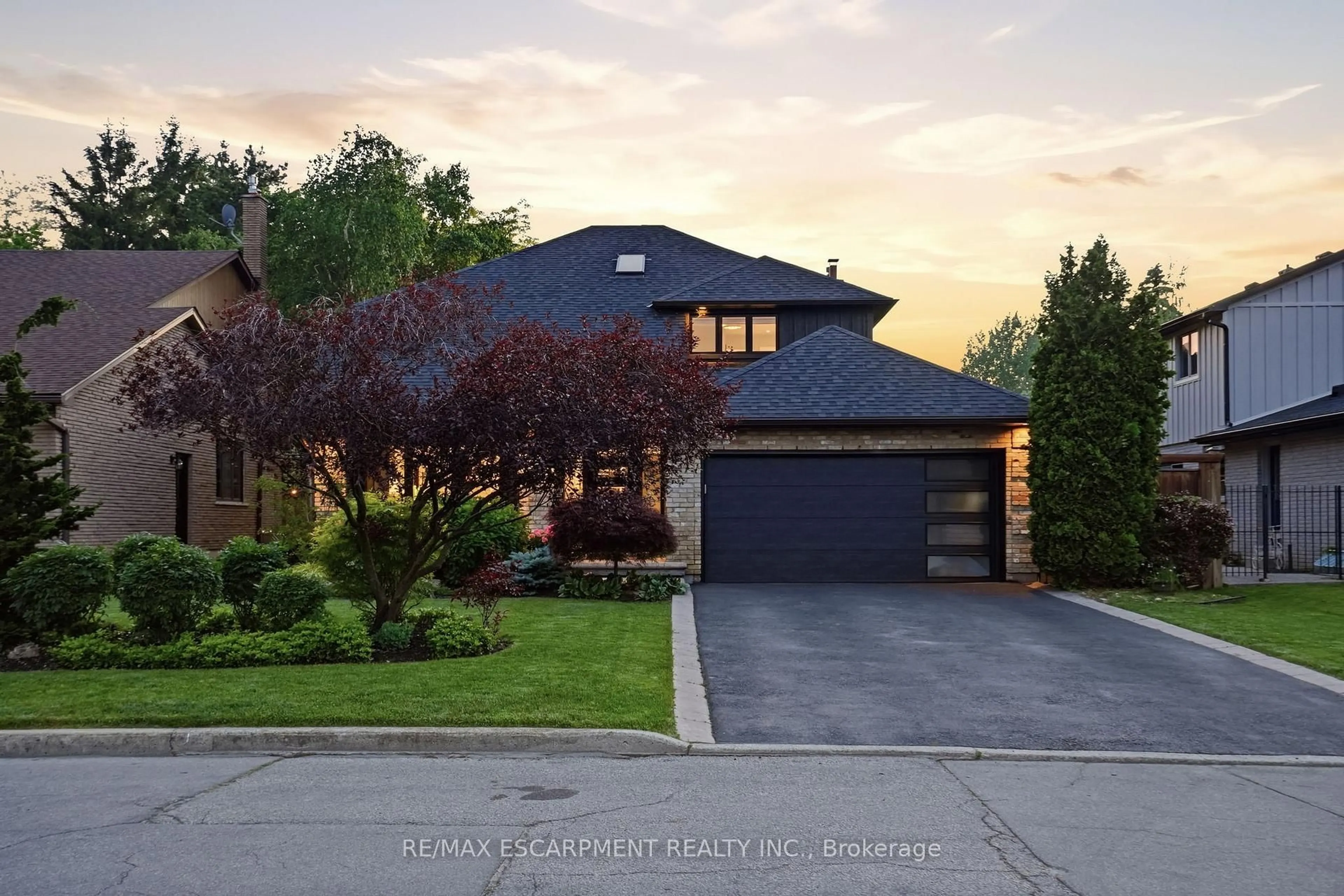 Home with brick exterior material, street for 617 Grays Rd, Hamilton Ontario L8E 2Z7