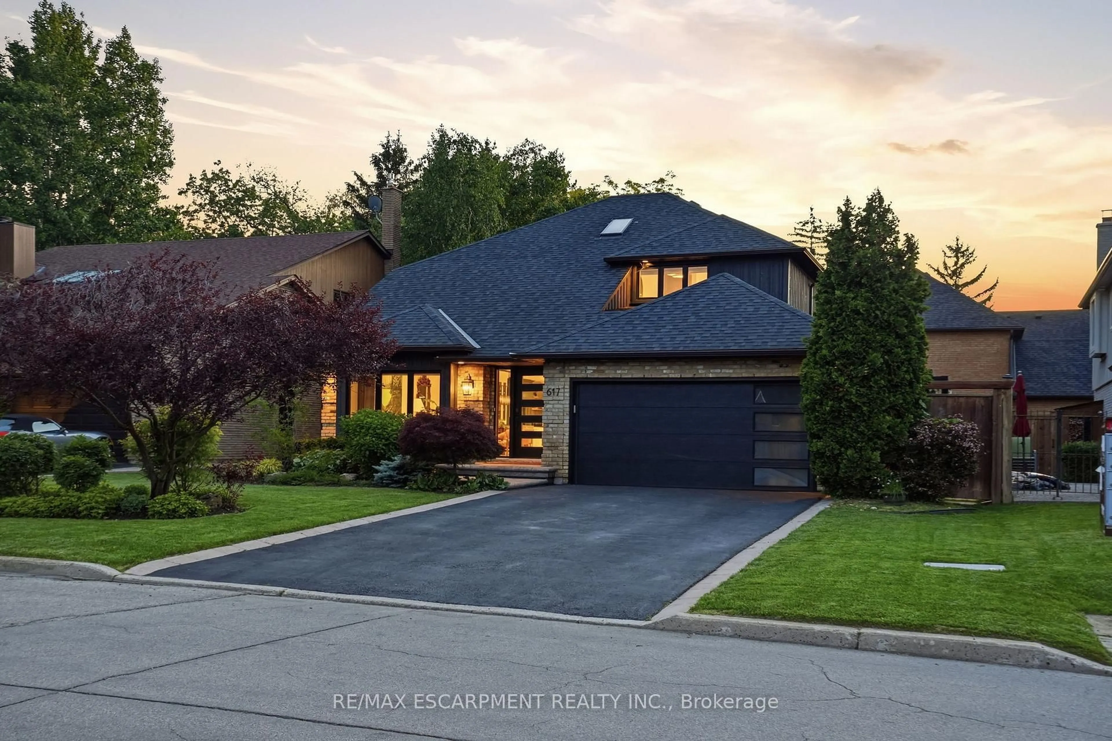 Home with brick exterior material, street for 617 Grays Rd, Hamilton Ontario L8E 2Z7