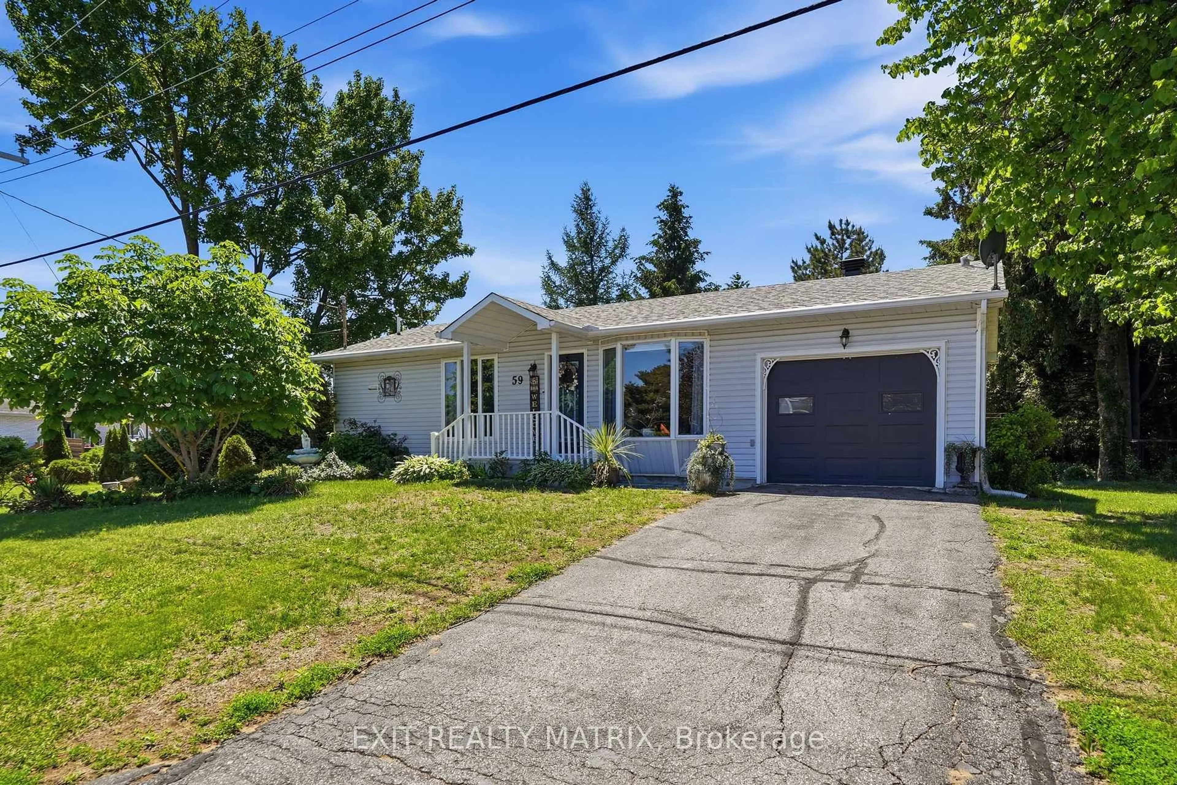 Home with vinyl exterior material, street for 59 Alexandre St, Alfred and Plantagenet Ontario K0B 1A0