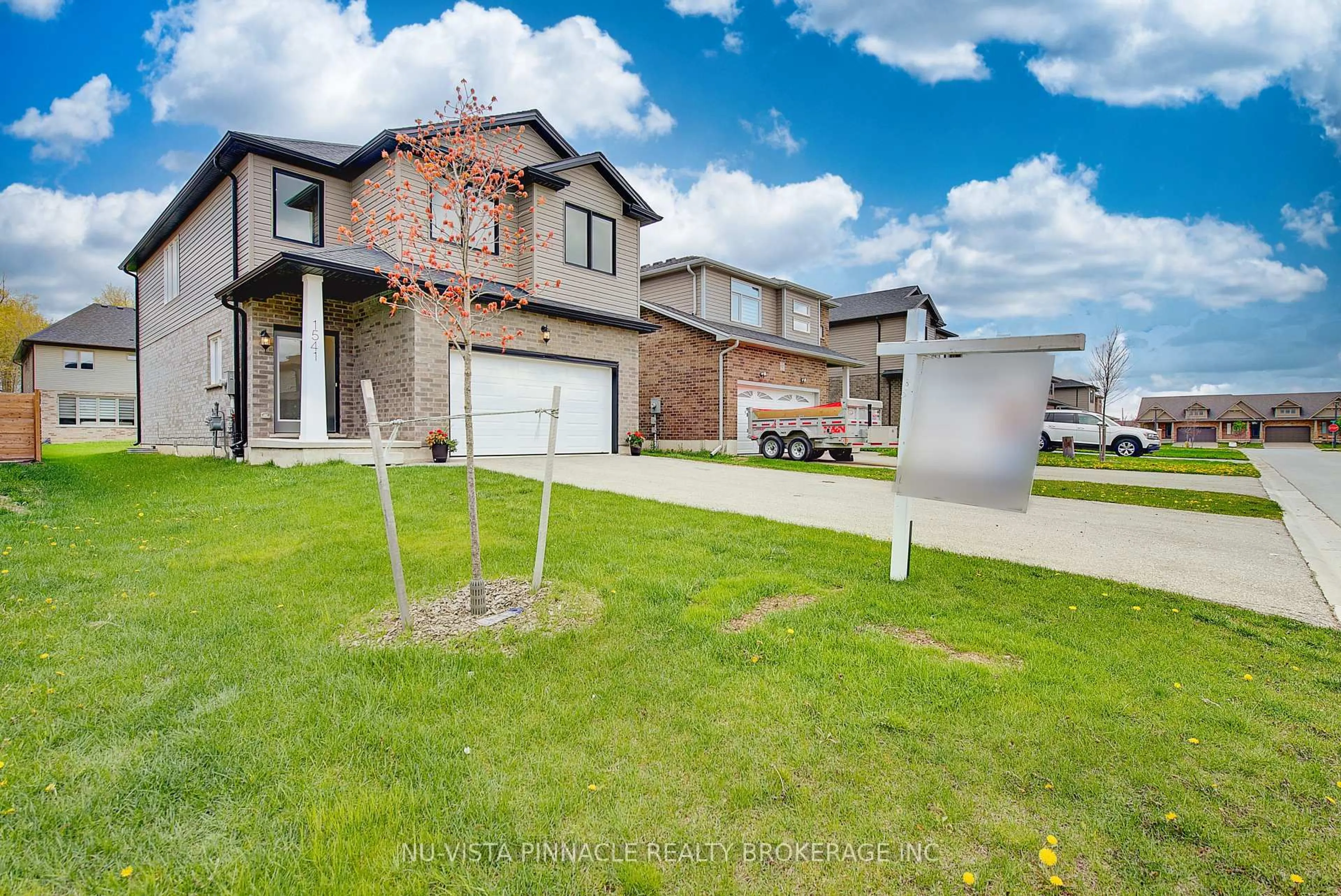 A pic from outside/outdoor area/front of a property/back of a property/a pic from drone, street for 1541 Applerock Ave, London North Ontario N6G 0M7