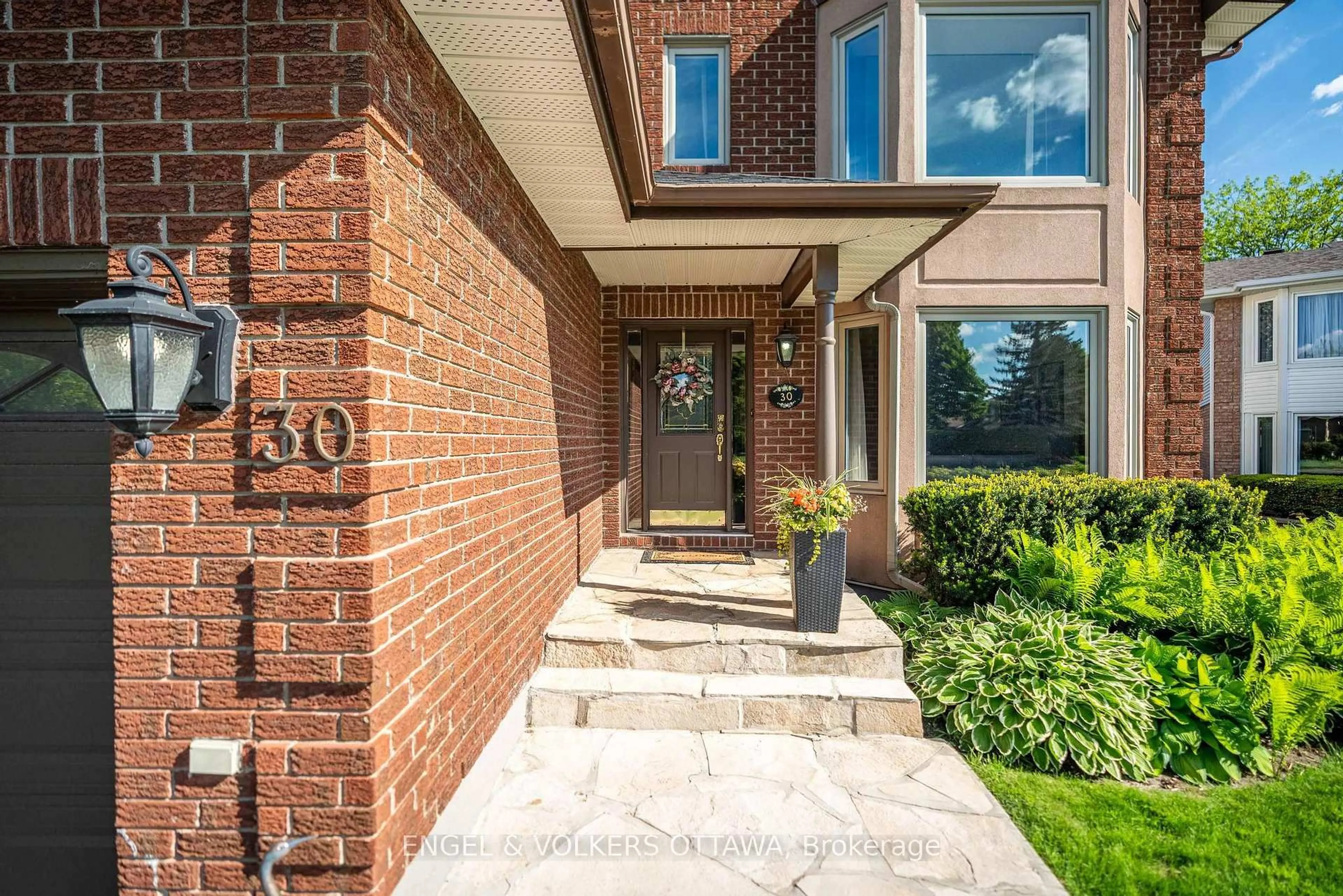 Home with brick exterior material, street for 30 Huntings End Ave, Kanata Ontario K2M 1R3