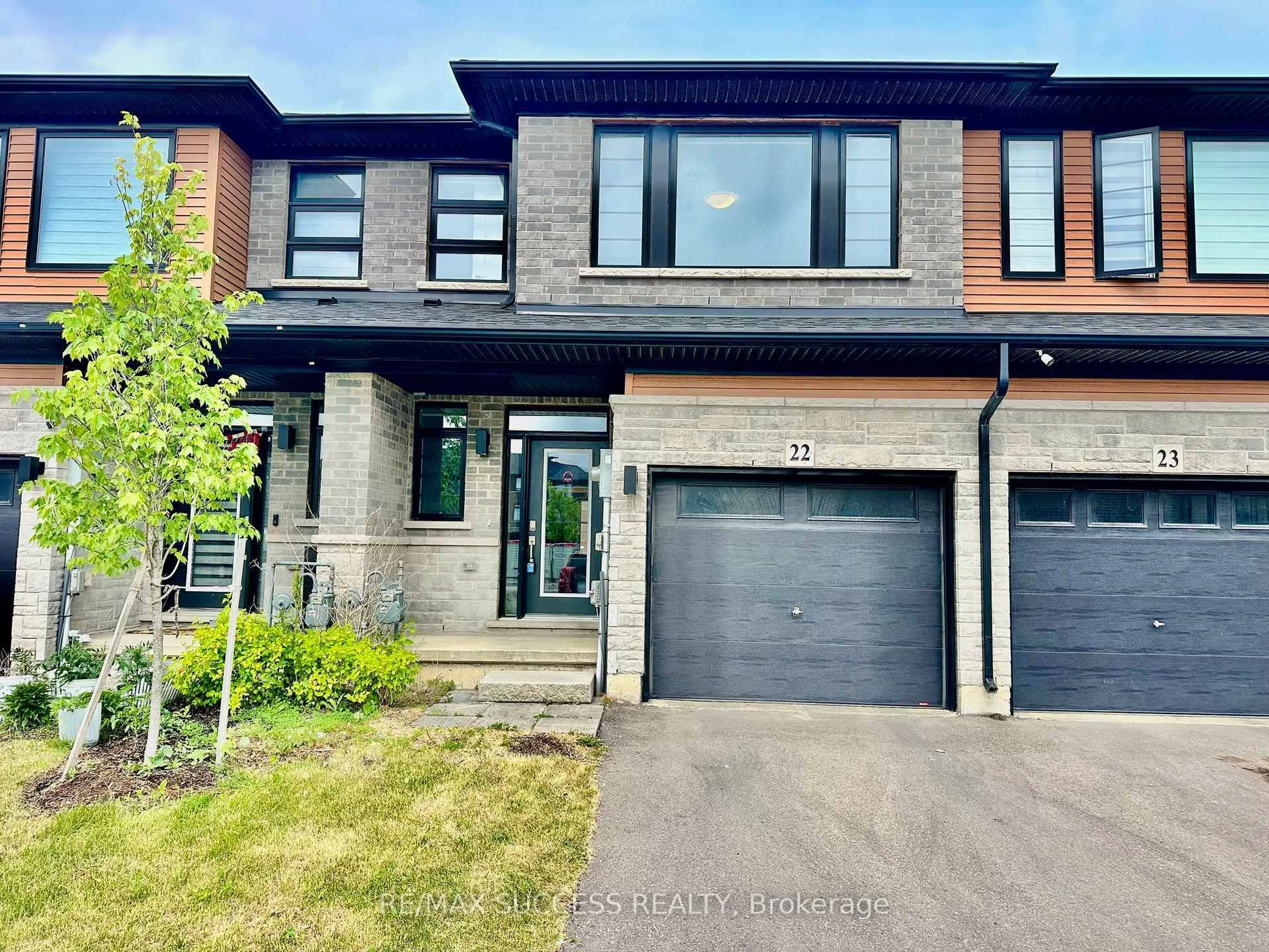 Home with brick exterior material, street for 461 Blackburn Dr #22, Brantford Ontario N3T 0W9