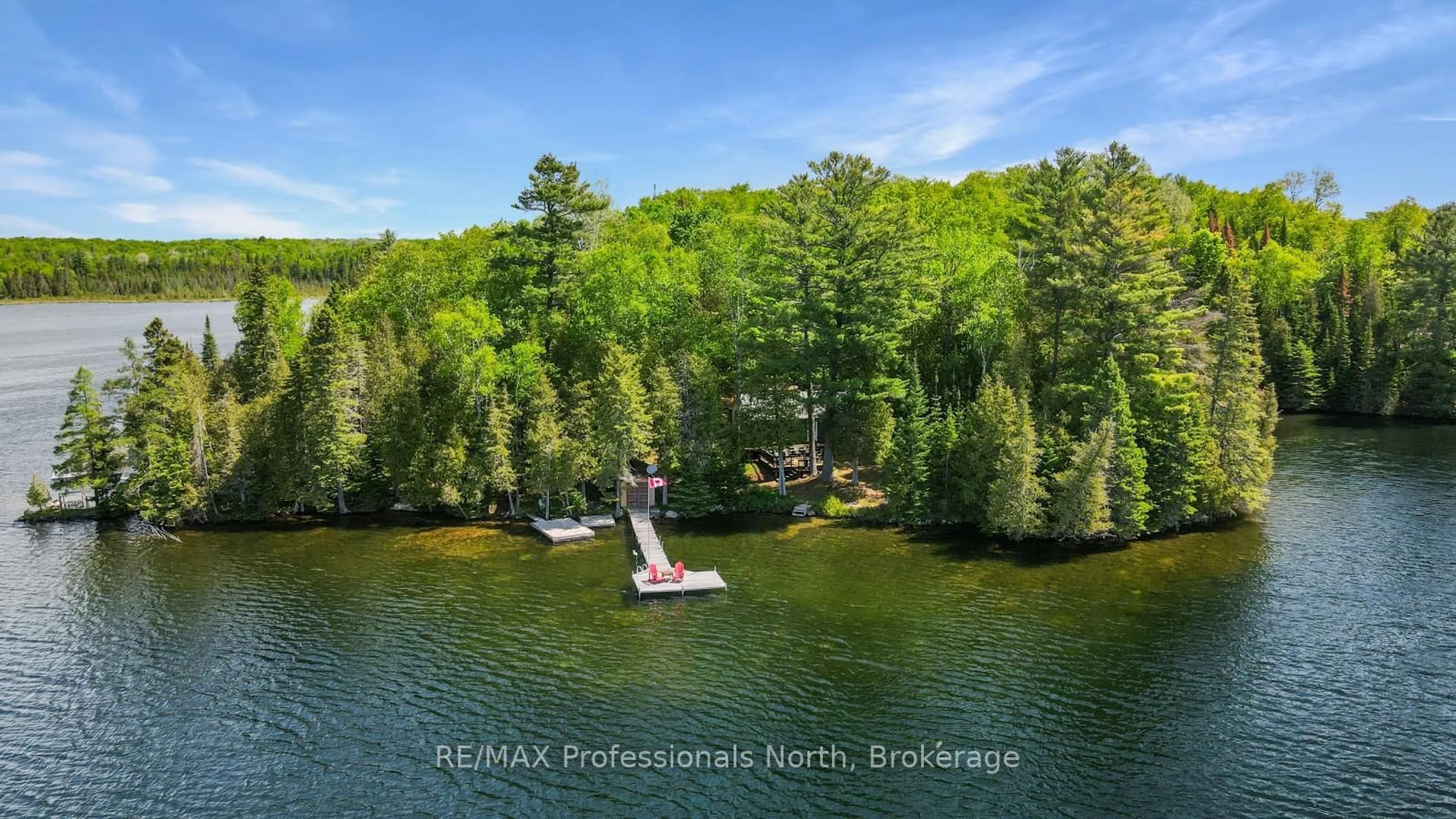 A pic from outside/outdoor area/front of a property/back of a property/a pic from drone, water/lake/river/ocean view for 1275 Quartz Lane, Highlands East Ontario K0M 1R0