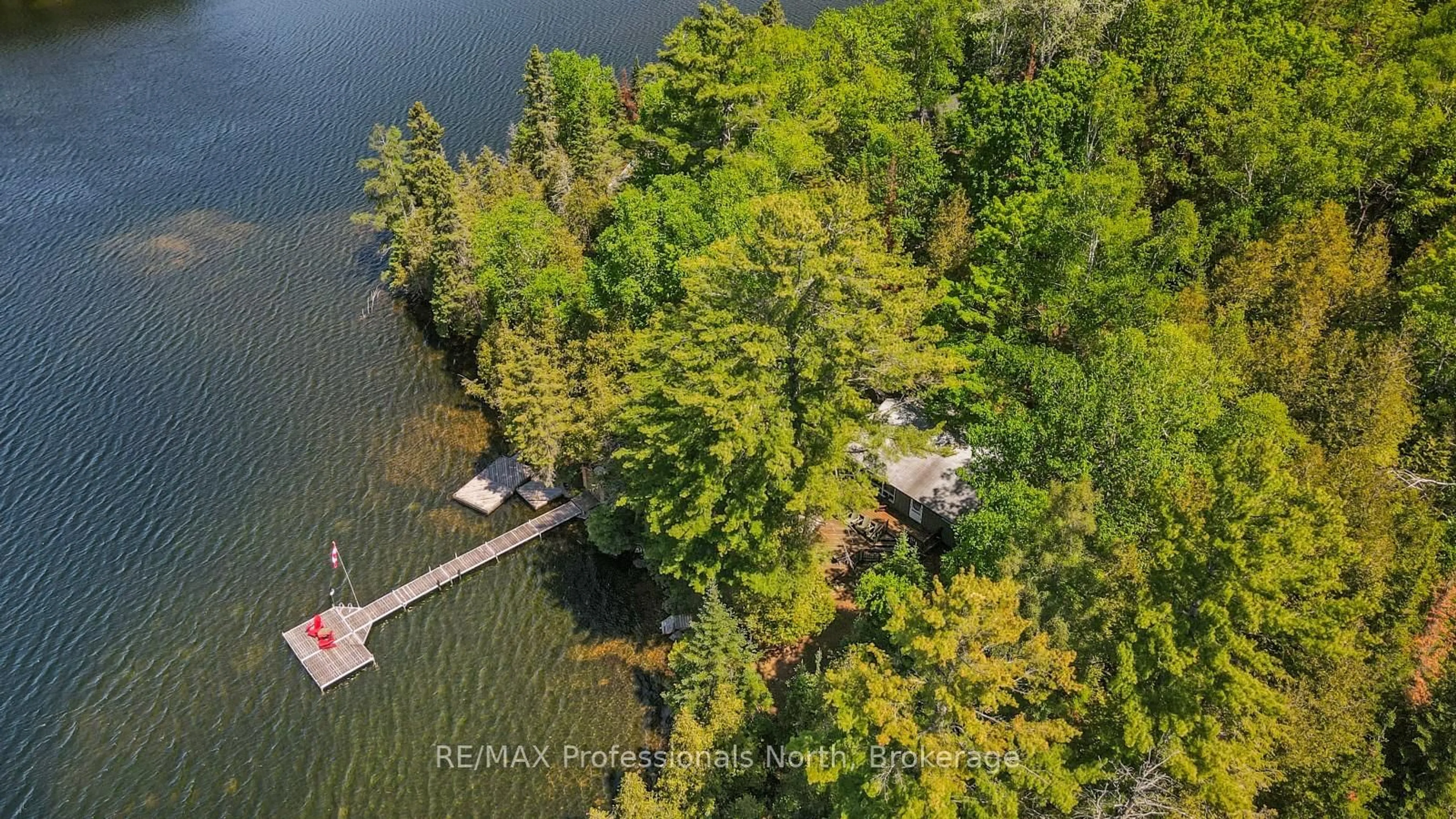 A pic from outside/outdoor area/front of a property/back of a property/a pic from drone, water/lake/river/ocean view for 1275 Quartz Lane, Highlands East Ontario K0M 1R0