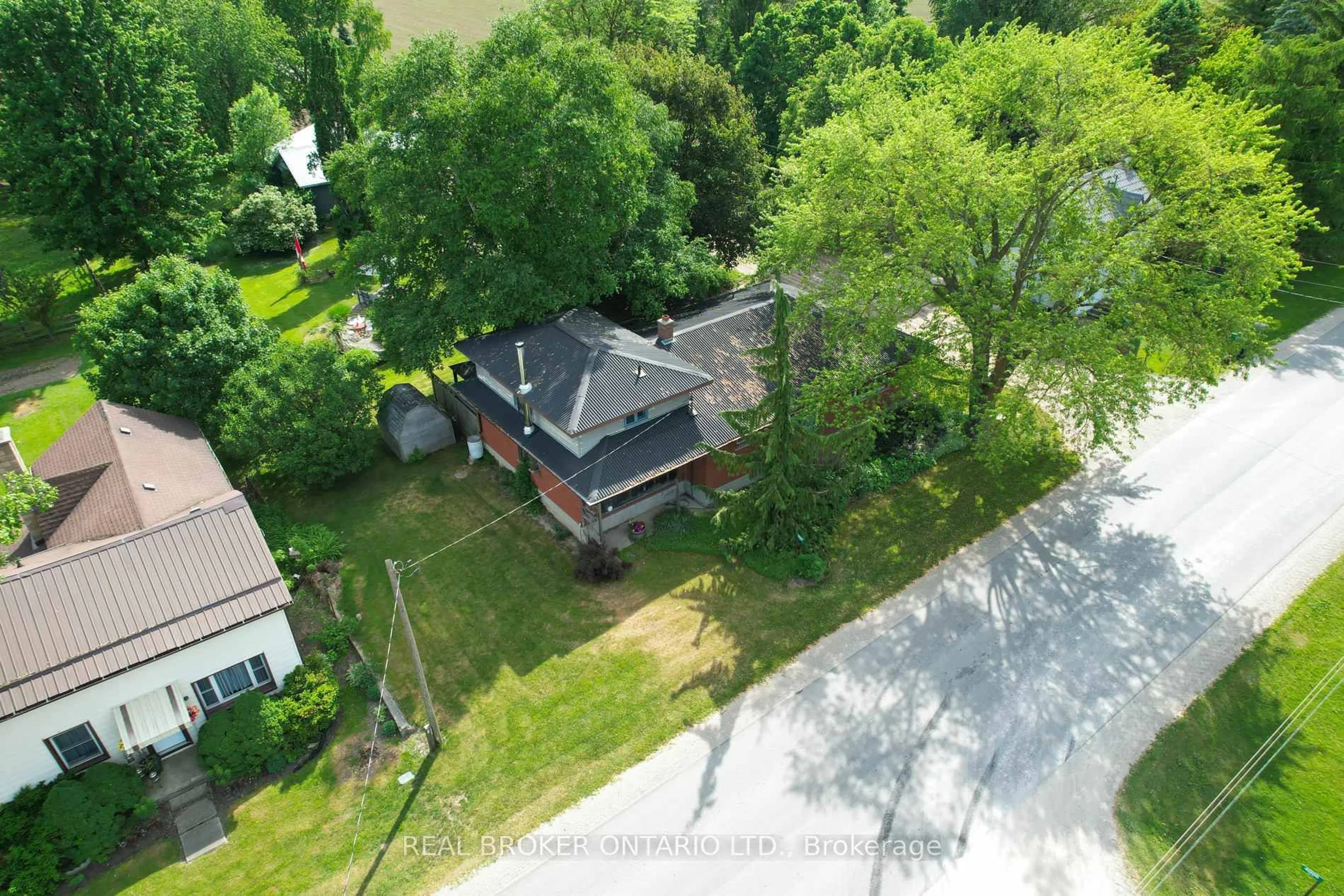 A pic from outside/outdoor area/front of a property/back of a property/a pic from drone, street for 4007 61 Line, Perth East Ontario N0K 1M0