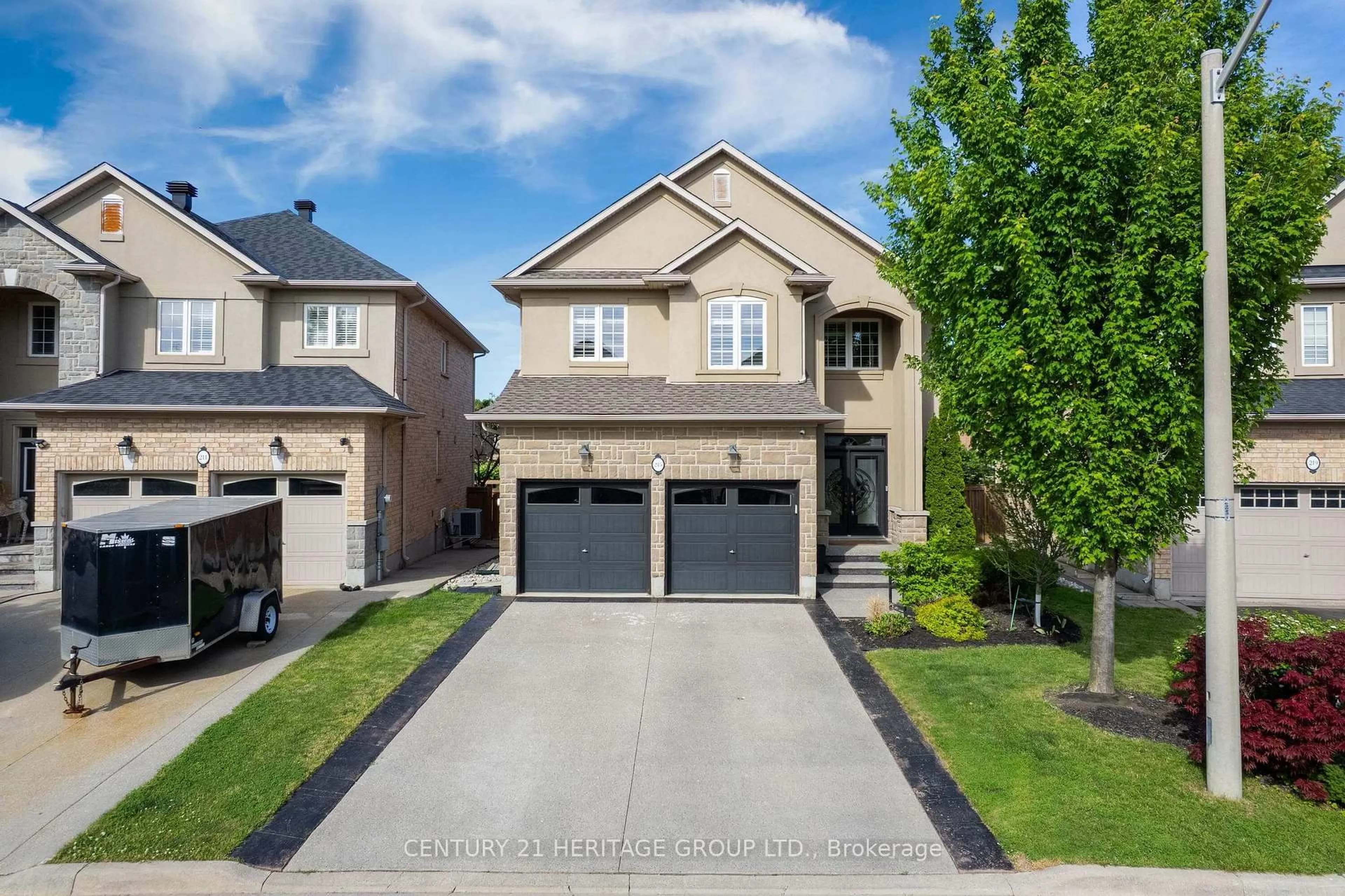 Home with brick exterior material, street for 215 Vinton Rd, Hamilton Ontario L9K 0G8